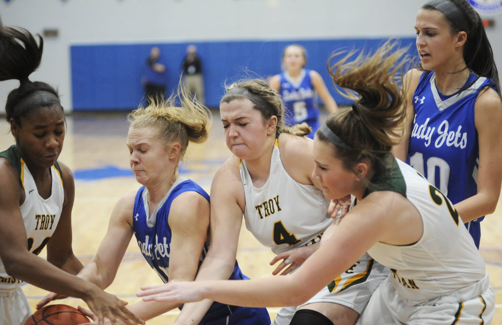 In a scrum for a loose ball are Alexis Salazar of Troy Christian (left), Chloe McGlinch of Franklin Monroe, Jalyn Forrer (TC), Sydney Taylor (TC) and Corina Conley (FM). Franklin Monroe defeated Troy Christian 43-28 in a D-IV girls high school basketball sectional semifinal at Brookville on Wednesday, Feb. 20, 2019. MARC PENDLETON / STAFF