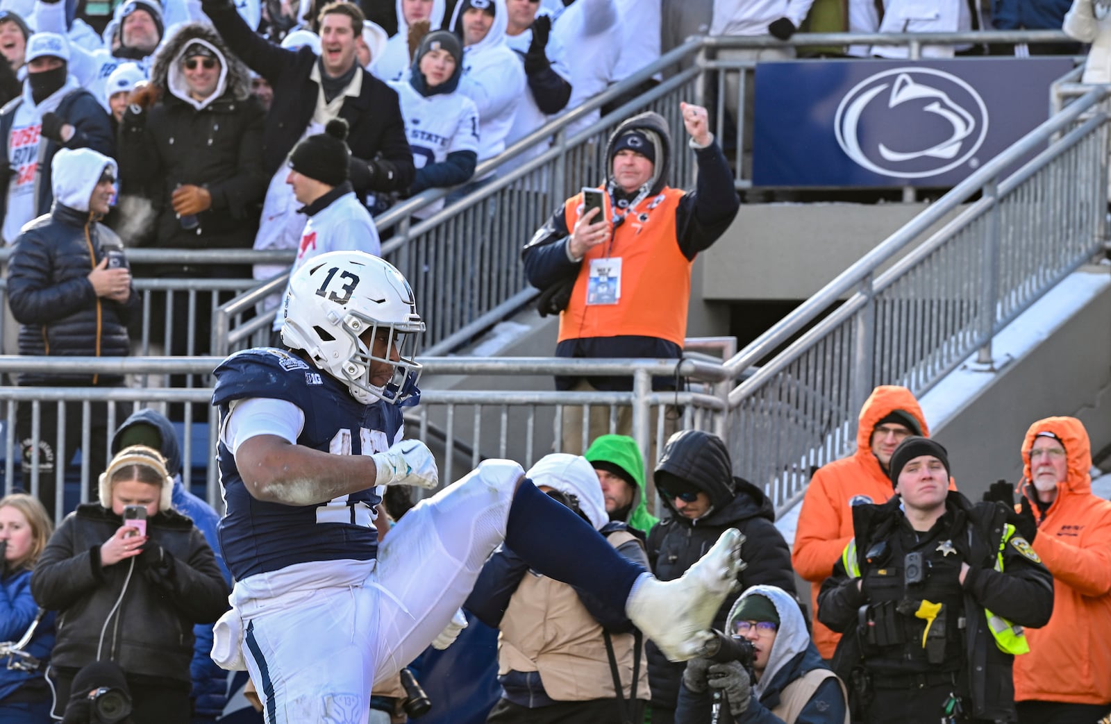 Penn State running back Kaytron Allen celebrates a touchdown against SMU during the first half in the first round of the NCAA College Football Playoff, Saturday, Dec. 21, 2024, in State College, Pa. (AP Photo/Barry Reeger)