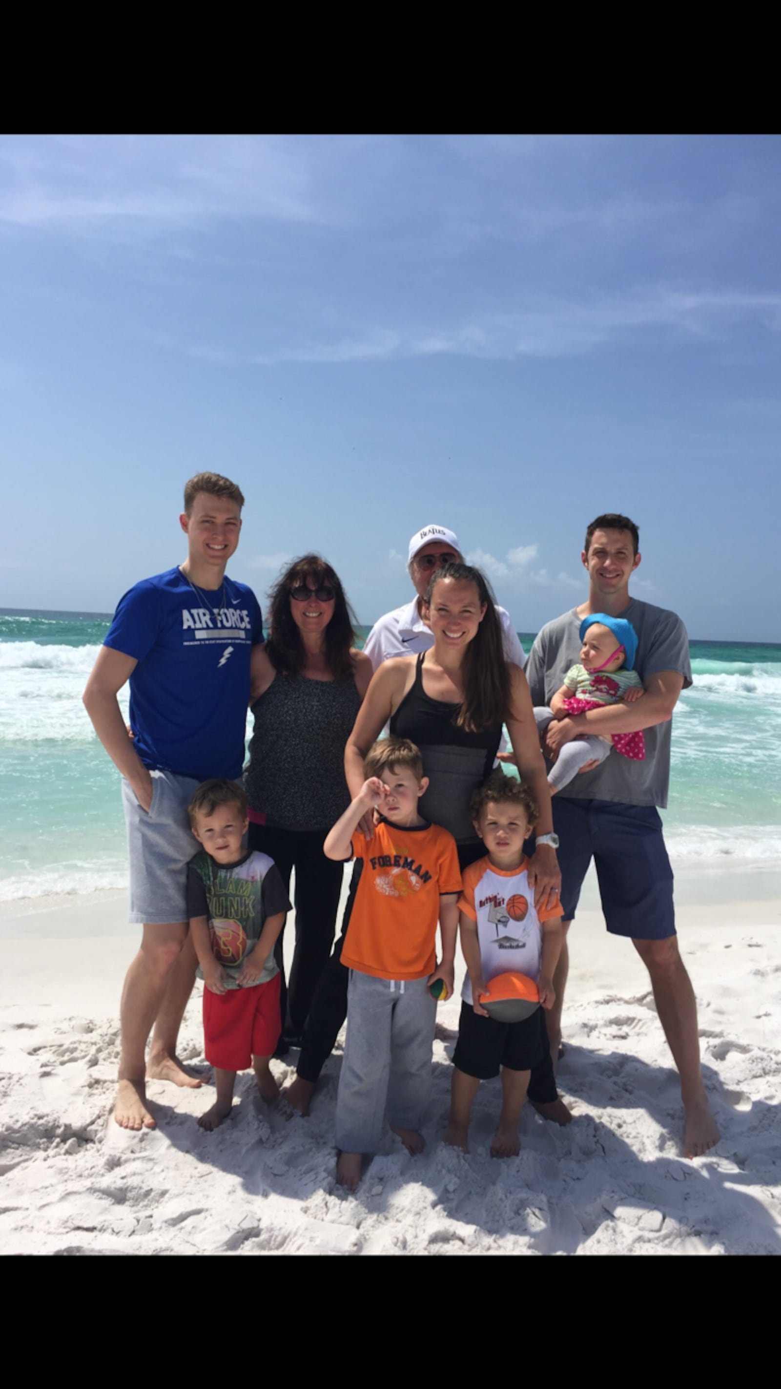 Dan Hughes and his family, from left, back row: son Bryce, a U.S. Air Force Academy Cadet and former basketball player for the Falcons, wife Mary, Dan, son in law Major Craig Bayer holding daughter Penny. From left, front row: Grandchildren Casey, Logan and Jonah Bayer and daughter Sara Bayer (in middle). CONTRIBUTED