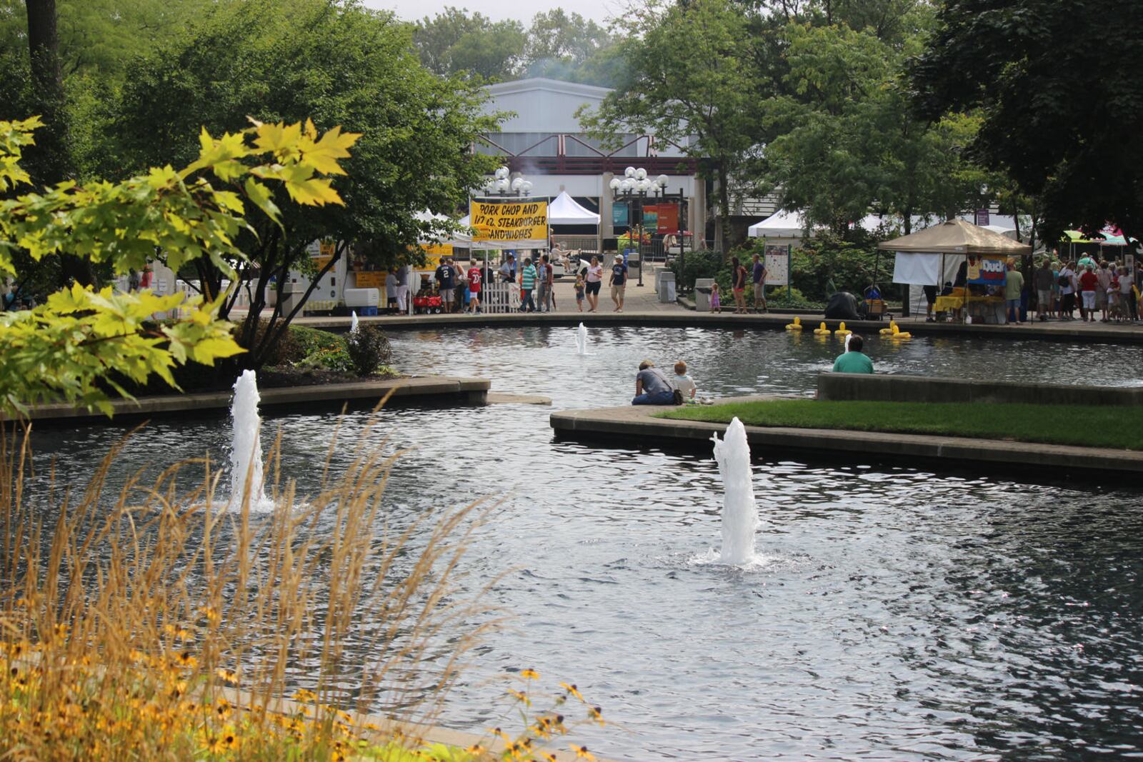 Lincoln Park was filled with people for the Holiday At Home festival Monday, Sept. 1 in Kettering. Chuck Hamlin \ Staff