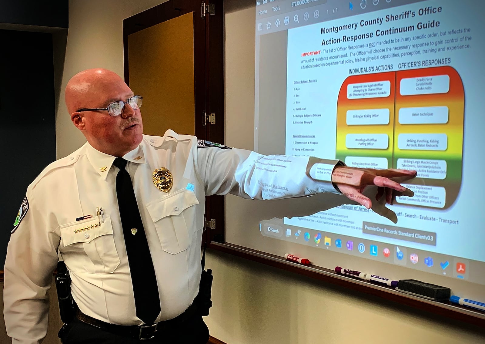 Butler Twp. Police Chief John Porter talks about the Montgomery County Sheriff's Office Action-Response Continuum Guide during a press conference Wednesday Jan. 18, 2023, after Butler Twp. Police Sgt. Todd Stanley was placed on leave after a video surfaced of him punching a woman during an arrest at McDonalds on York Commons Blvd. MARSHALL GORBY\STAFF