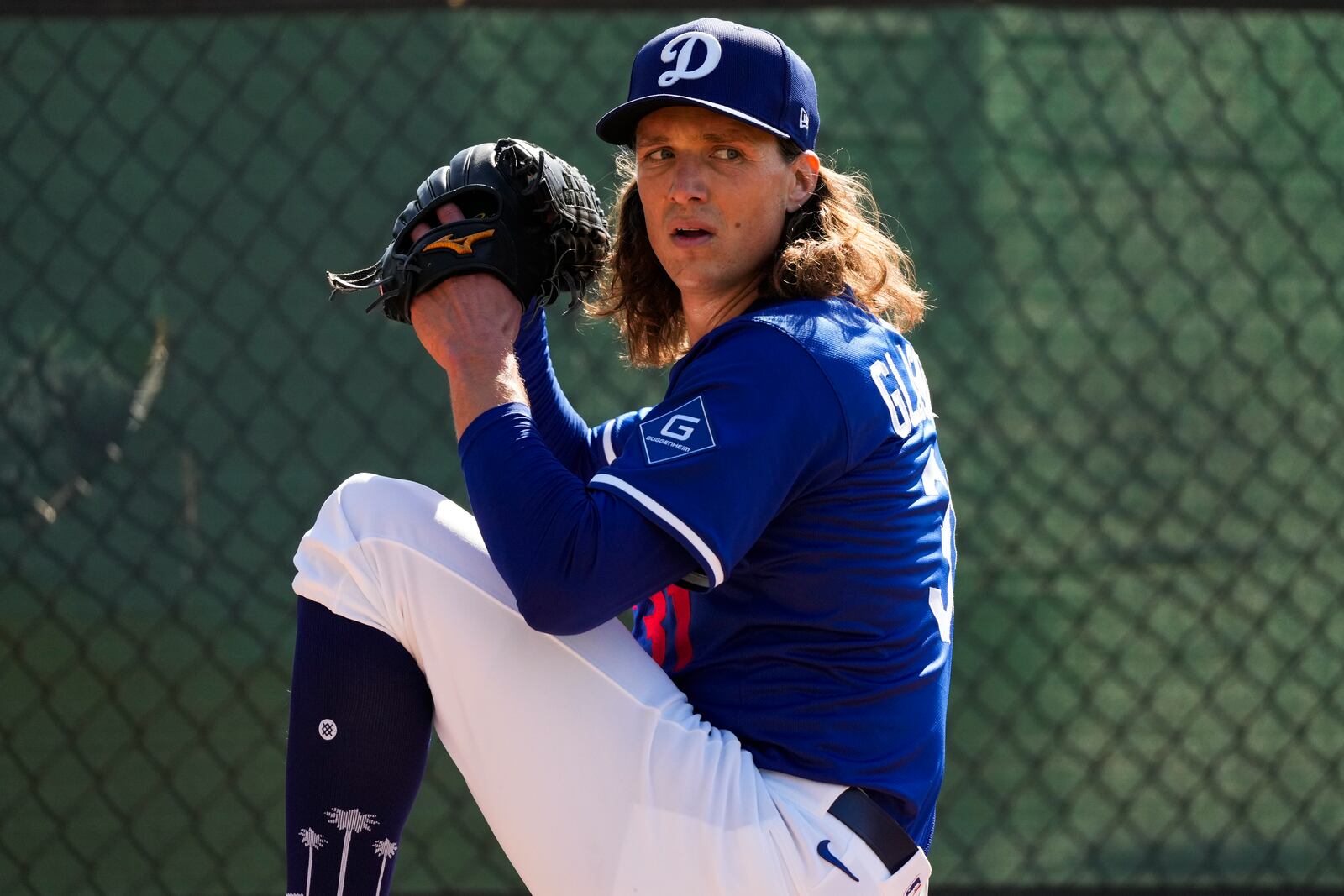 Los Angeles Dodgers pitcher Tyler Glasnow throws during spring training baseball practice, Tuesday, Feb. 18, 2025, in Phoenix. (AP Photo/Ashley Landis)