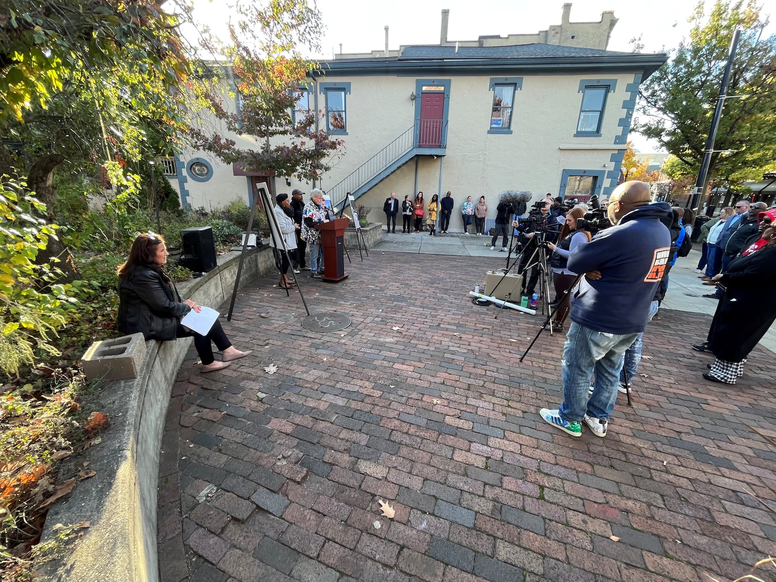 A team of four artists will create a new memorial in a plaza near the eastern end of the East Fifth Street business district in the Oregon District to honor the lives lost in the Aug. 4, 2019, mass shooting. CORNELIUS FROLIK / STAFF