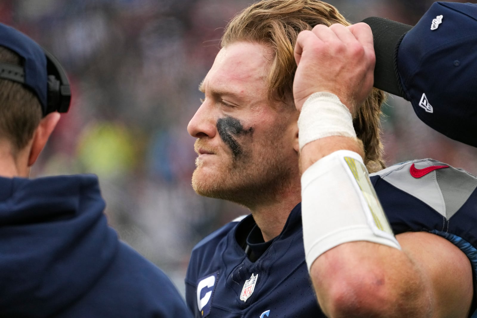 Tennessee Titans quarterback Will Levis (8) looks on from the sideline during the second half of an NFL football game Sunday, Dec. 15, 2024, in Nashville, Tenn. (AP Photo/George Walker IV)