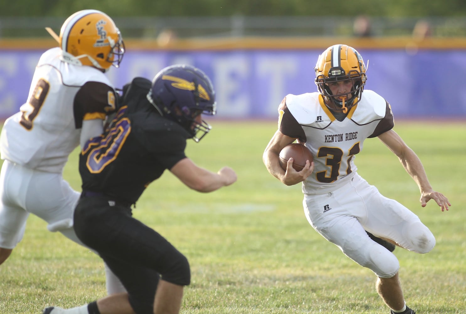 Photos: Mechanicsburg beats Kenton Ridge 27-3 in Week 1