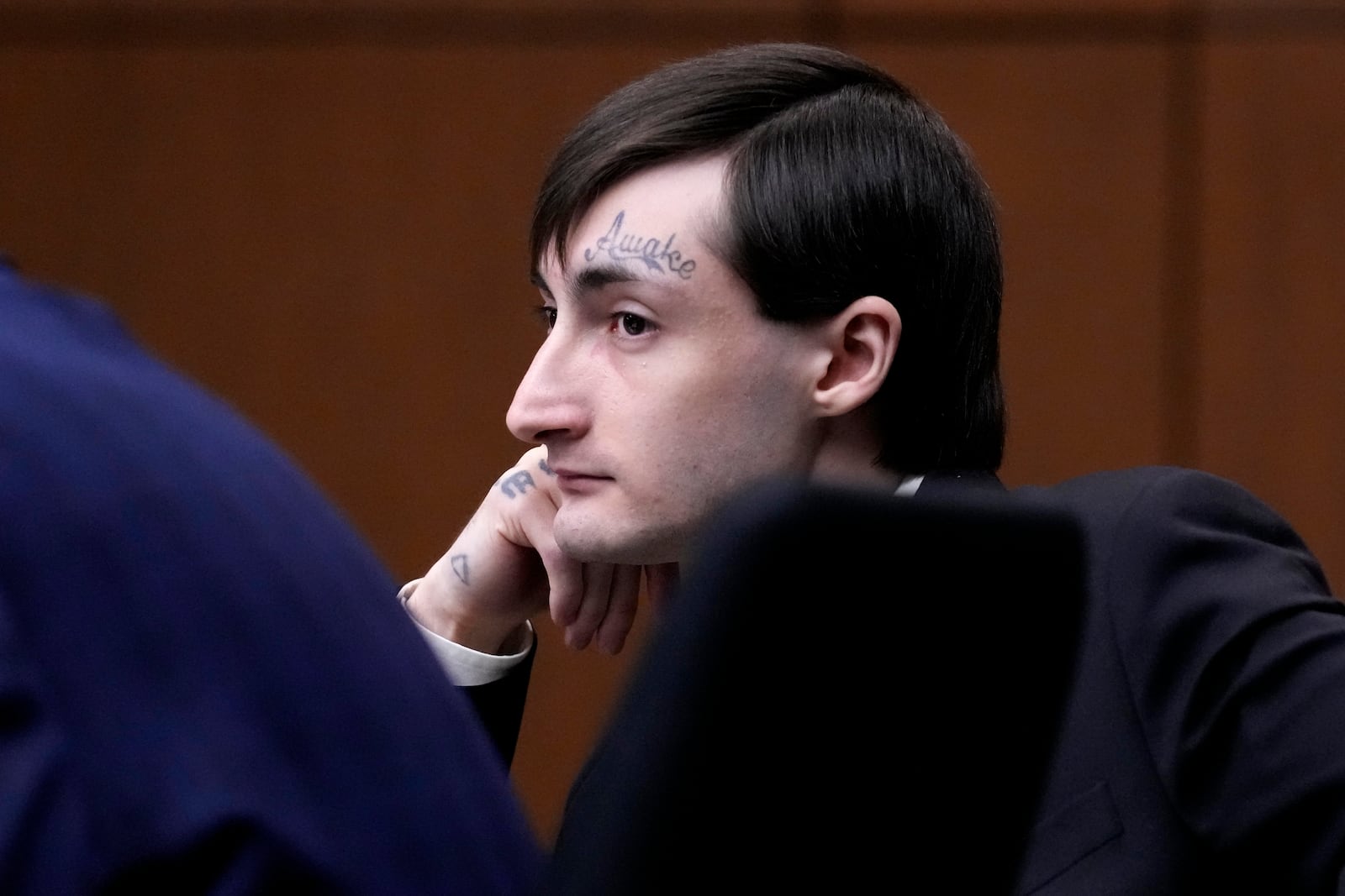 FILE - Robert E. Crimo III., watches the jury selection process during the first day of his trial at the Lake County Courthouse, Waukegan, Ill., Monday, Feb. 24, 2025. (AP Photo/Nam Y. Huh, Pool, File)