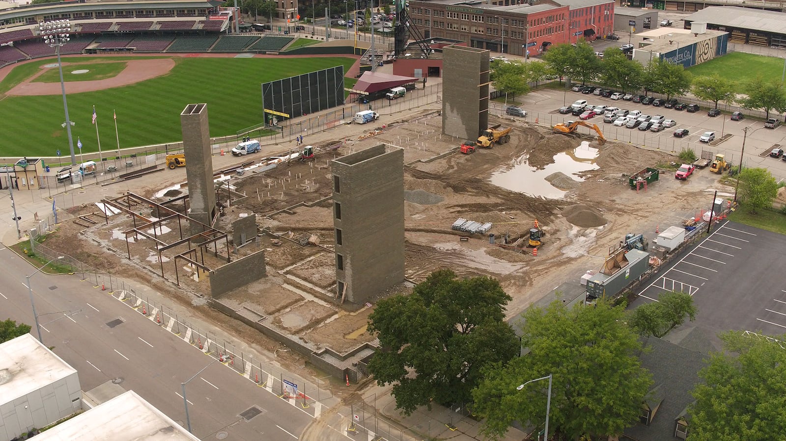 Construction is underway for a new apartment building that is located just beyond the outfield at Fifth Third Field in downtown Dayton. Centerfield Flats is a 112 unit, L-shaped building being built by Woodard Development that will add to the hundreds of apartments and condos built downtown in the past few years.  The five-story modern brick design will include stadium seating in a community room for views of the ballpark.  The building is about 120,000 square feet.  Units will range in size, offering between 532-square-foot studios to 1,717-square-foot units with three bedrooms.  Construction on the apartments is expected to take 12 to 13 months, with units opening in the summer of 2019.   TY GREENLEES / STAFF