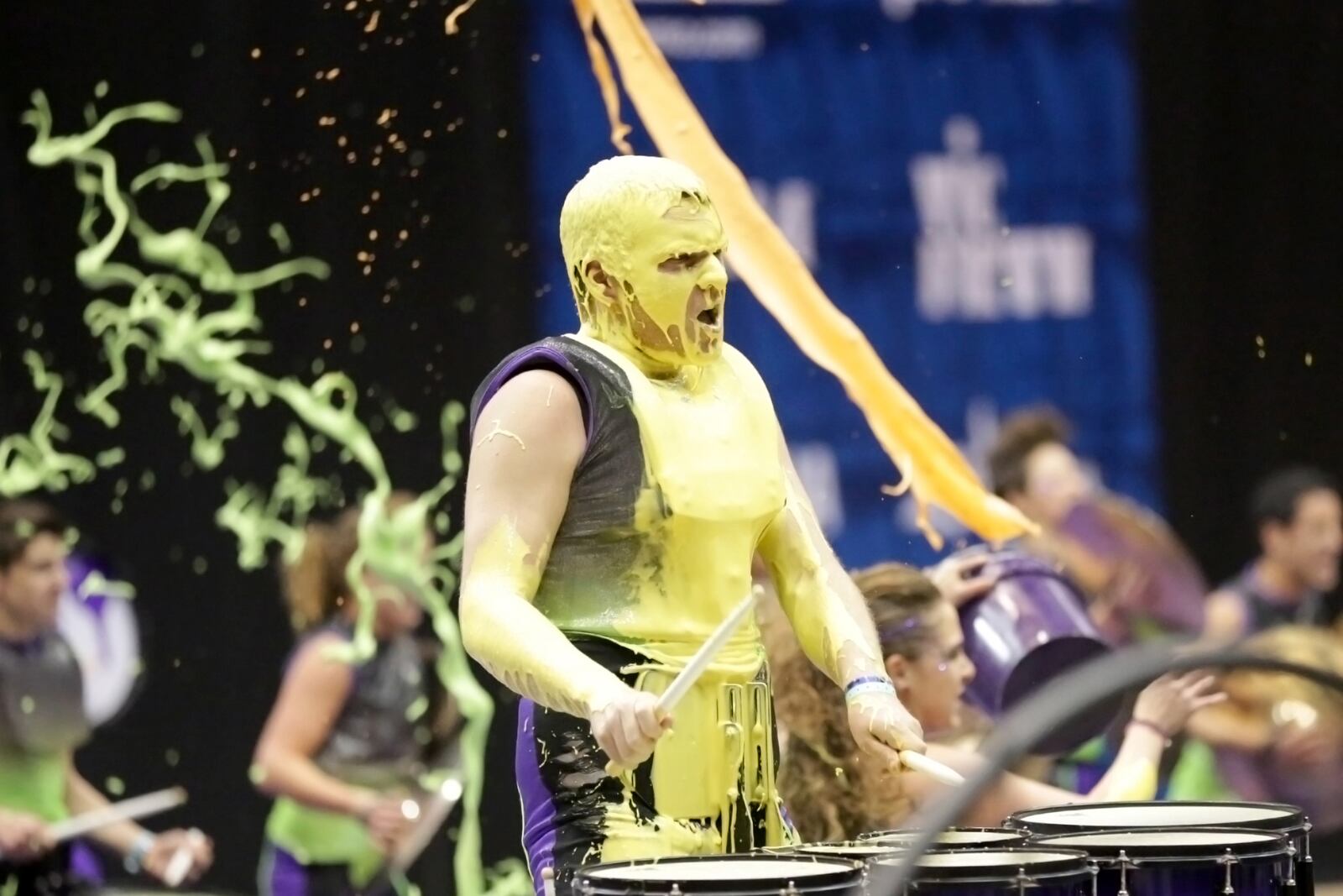 A paint-splattered percussionist is photographed April 20, 2013 at UD Arena. ADAM ALONZO/CONTRIBUTED