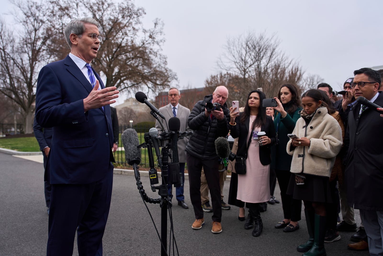 Treasury Secretary Scott Bessent speaks with reporters at the White House, Thursday, March 13, 2025, in Washington. (AP Photo/Evan Vucci)