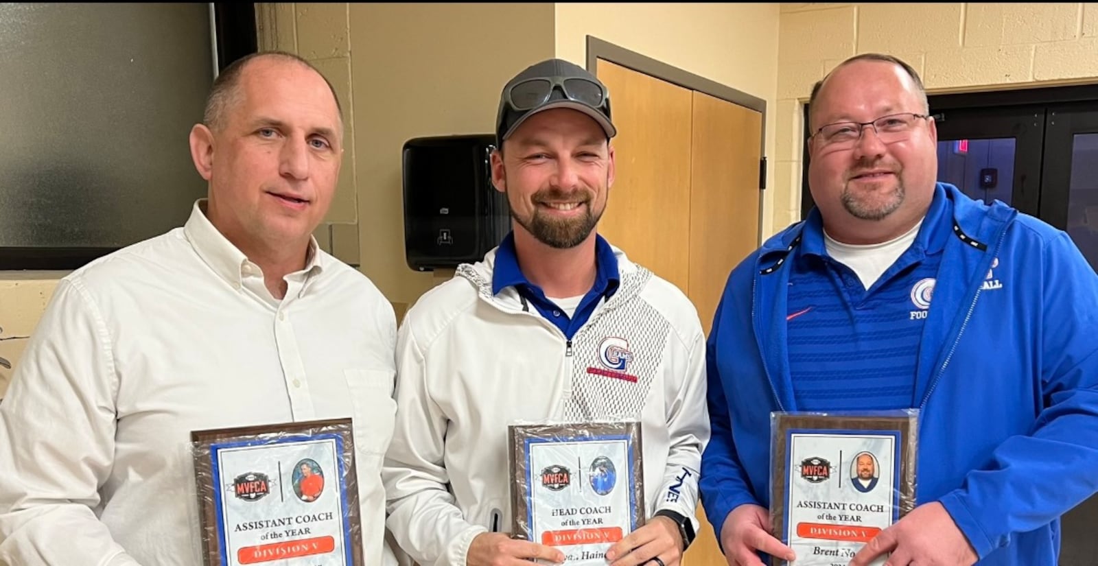 2024 Miami Valley Football Coaches Association coaches of the year from Greeneview Neil Kasner, Brian Haines (center, head coach) and Brett Noes