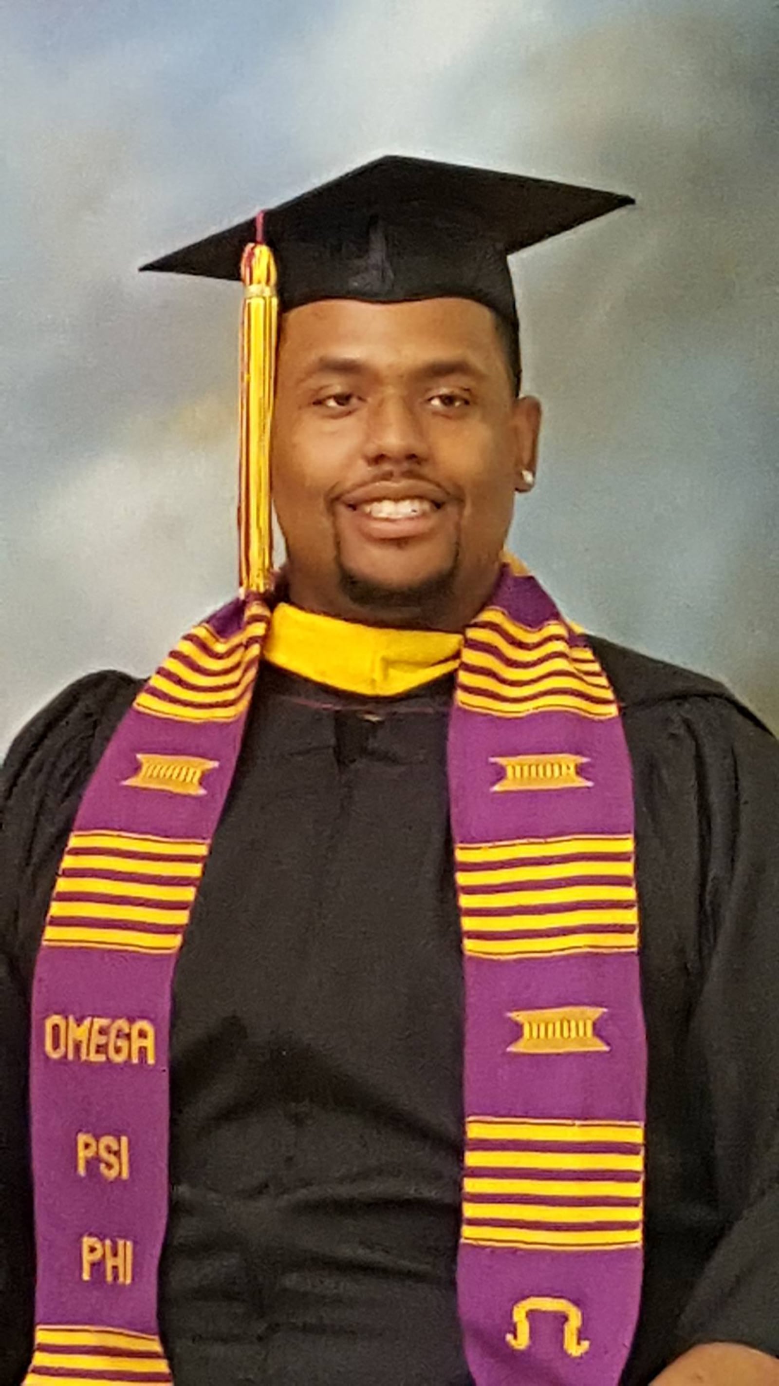 Keenan Woods at his graduation from Central State University in 2014. He holds a bachelor's degree in business administration and finance and said his father's pursuit of higher education inspired him. CONTRIBUTED