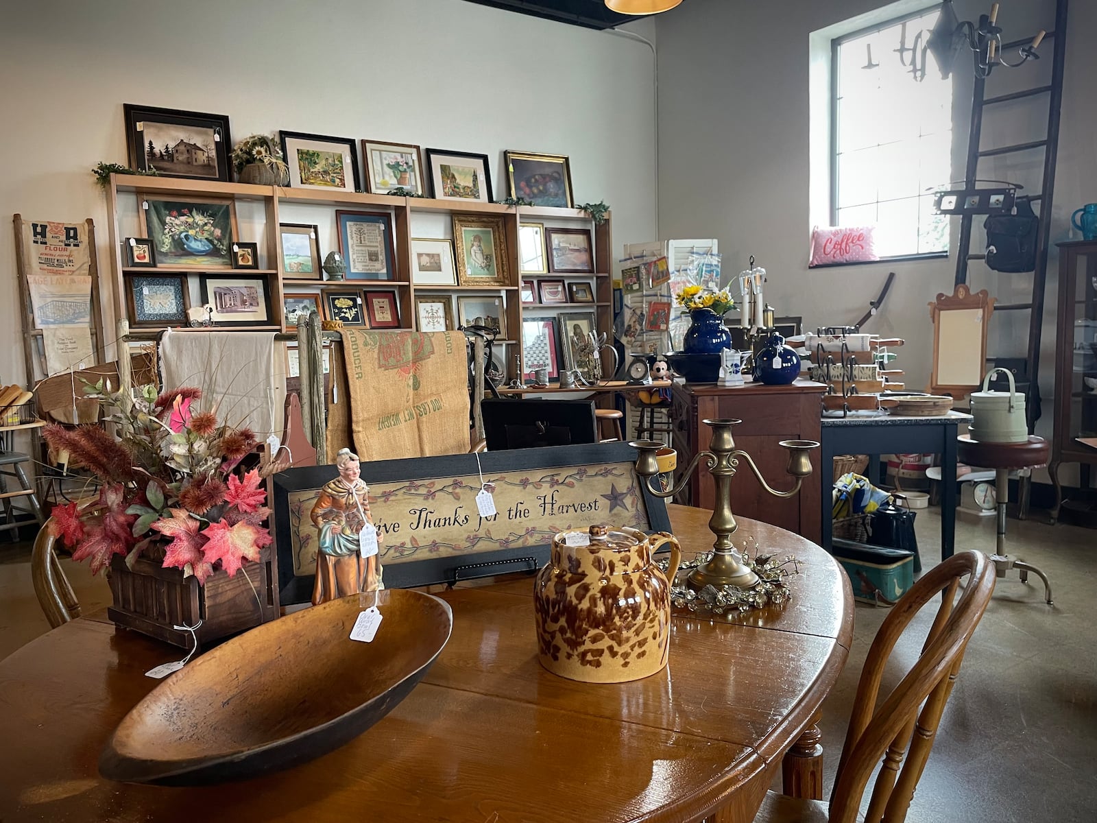 Mulberry & Main, a new bistro with a coffee bar, beer taps and two rooms filled with antiques, is located at 130 Main St. in Brookville. NATALIE JONES/STAFF