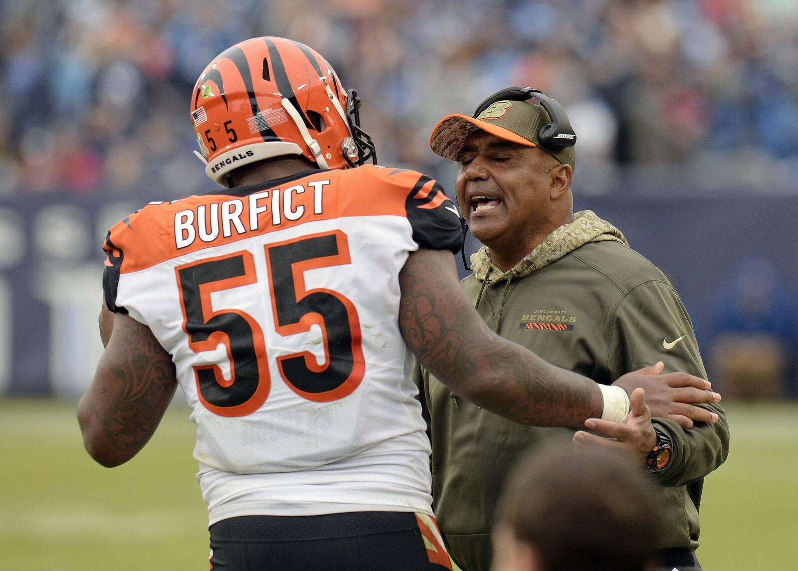 Cincinnati Bengals head coach Marvin Lewis talks with outside linebacker Vontaze Burfict (55) after Burfict was ejected for making contact with an official in the first half of an NFL football game against the Tennessee Titans Sunday, Nov. 12, 2017, in Nashville, Tenn. (AP Photo/Mark Zaleski)