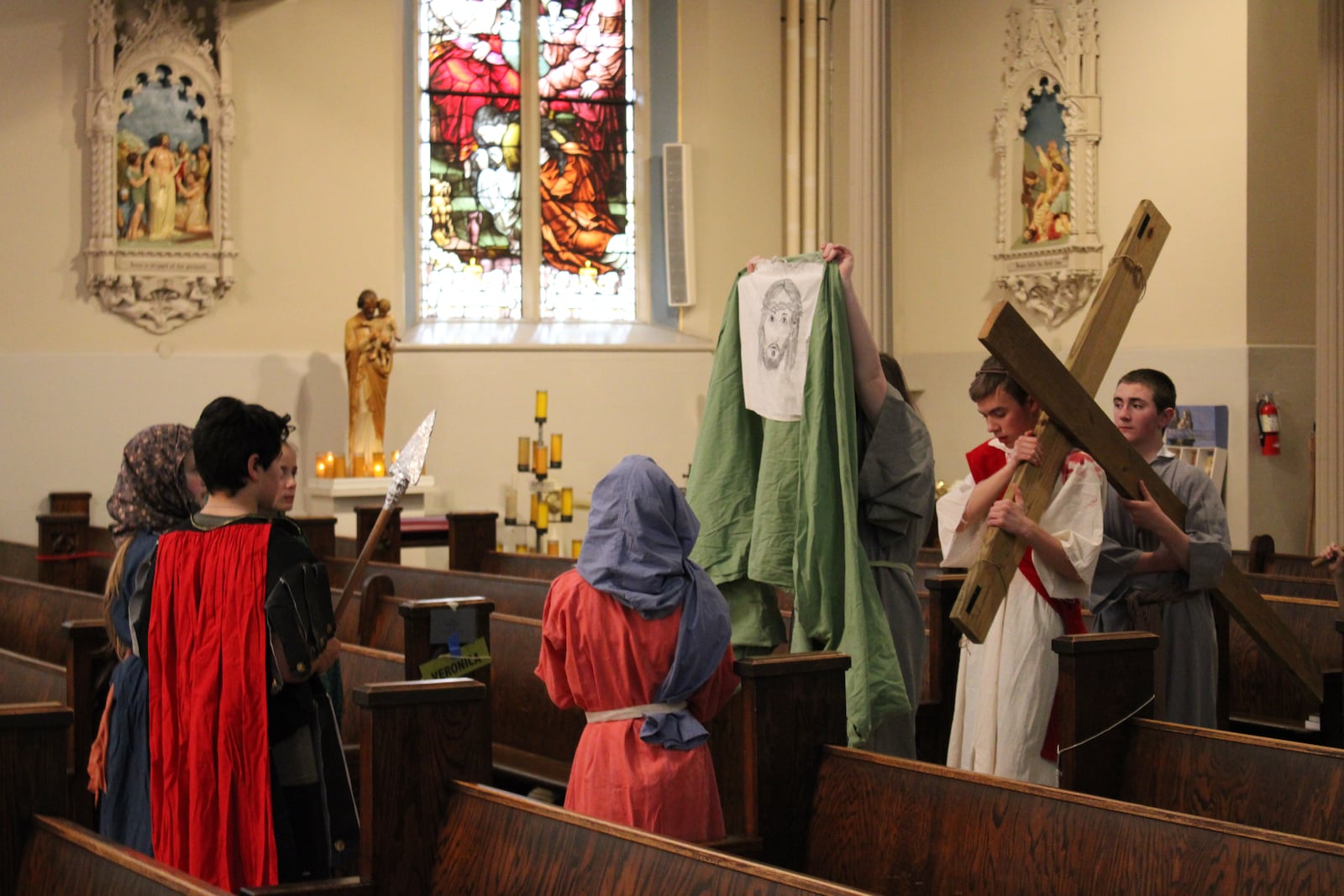 Youth at Emmanuel Catholic Church in Dayton participate in a Living Stations of the Cross. CONTRIBUTED