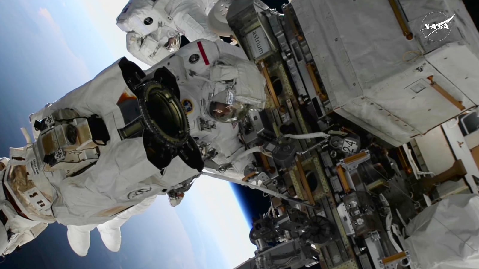 FILE - In this image from video provided by NASA, astronauts Suni Williams, foreground, and Butch Wilmore work outside the International Space Station during a spacewalk, Thursday, Jan. 30, 2025. (AP Photo/NASA TV, File)