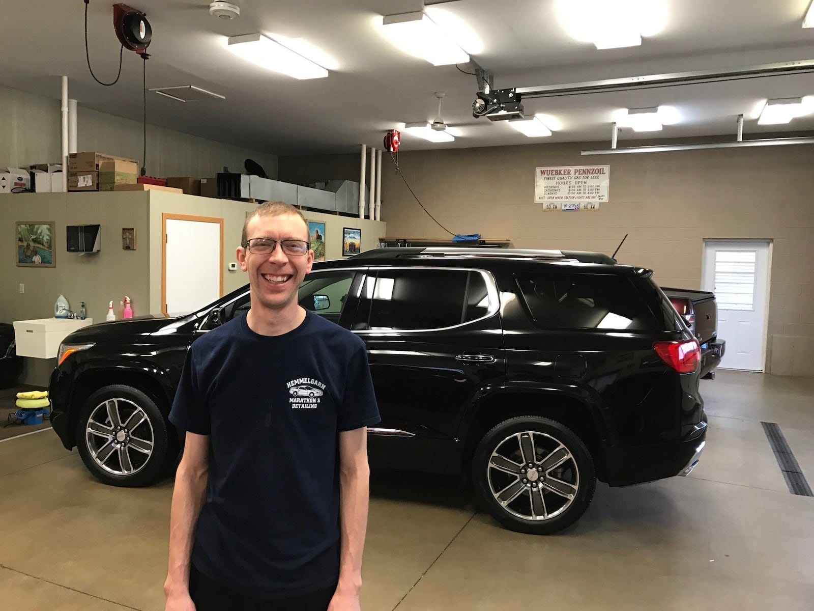 Paul Hemmelgarn runs the Hemmelgarn Detailing Shop next to the Marathon gas station and is the director of basketball operations at St. Henry High School. Tom Archdeacon/CONTRIBUTED