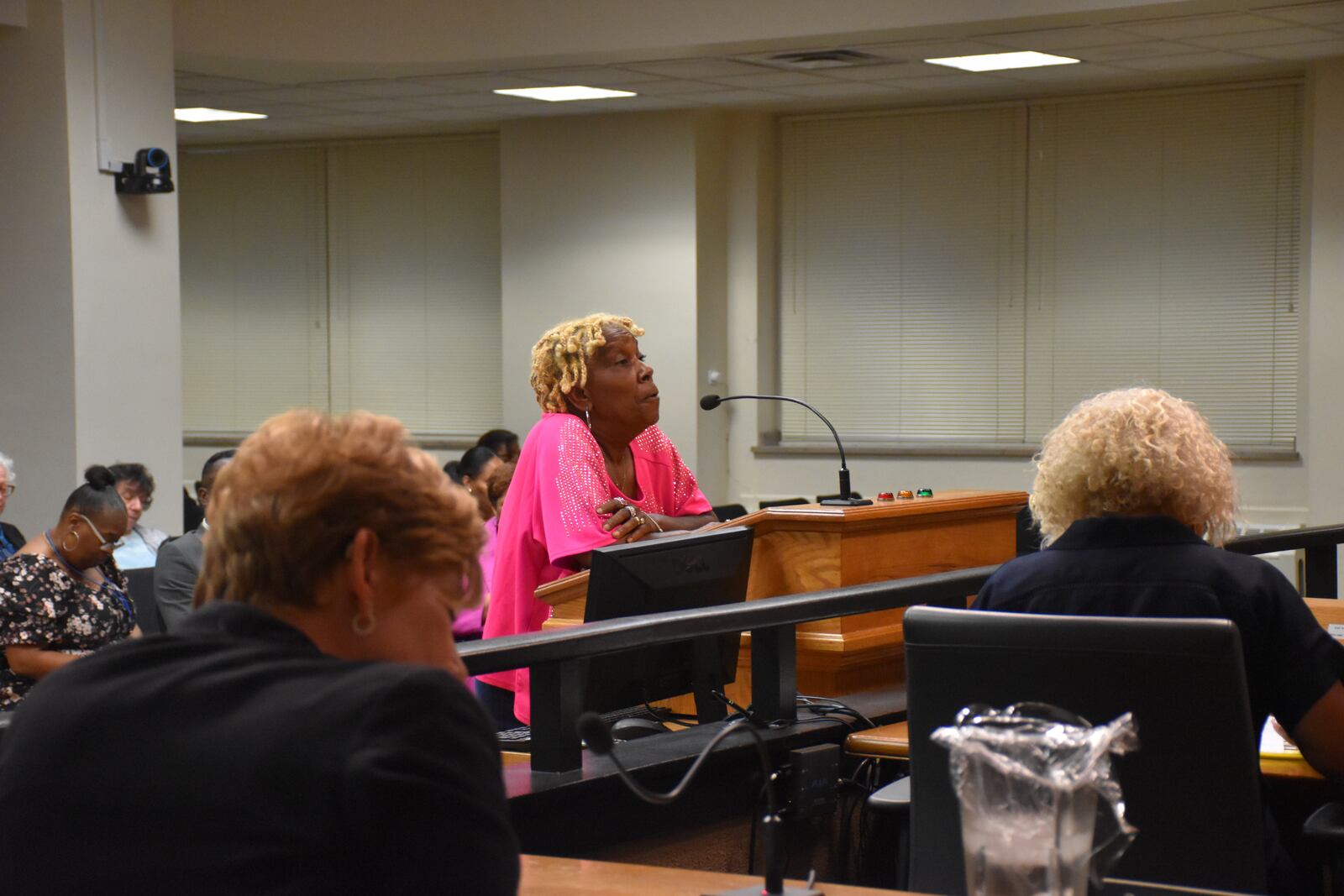 Annette Gibson-Strong, a 65-year-old resident of Dayton's Carillon neighborhood, speaks at a Dayton City Commission meeting on May 22, 2024. She opposes new housing being built in her neighborhood for people recovering from substance abuse. CORNELIUS FROLIK / STAFF