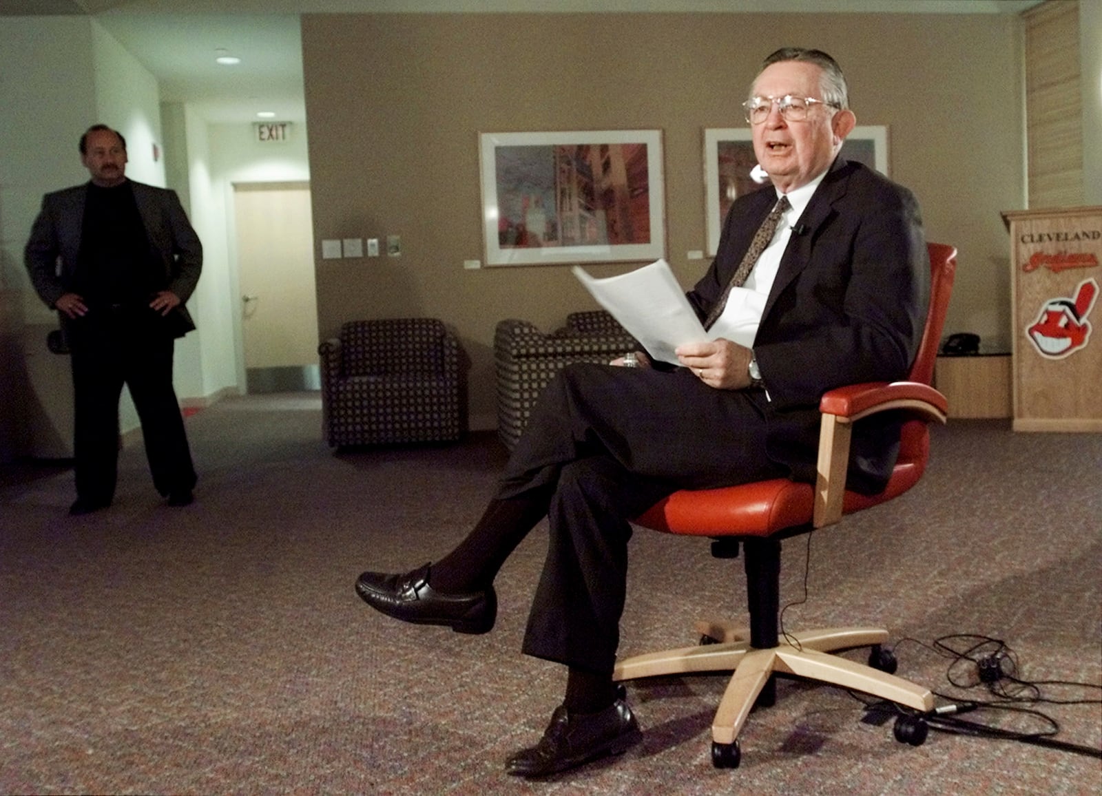 FILE - Cleveland Indians owner Larry Dolan answers questions about the team's 2001 season during a news conference at Jacobs Field in Cleveland, Nov. 3, 2000. (AP Photo/Mark Duncan, File)