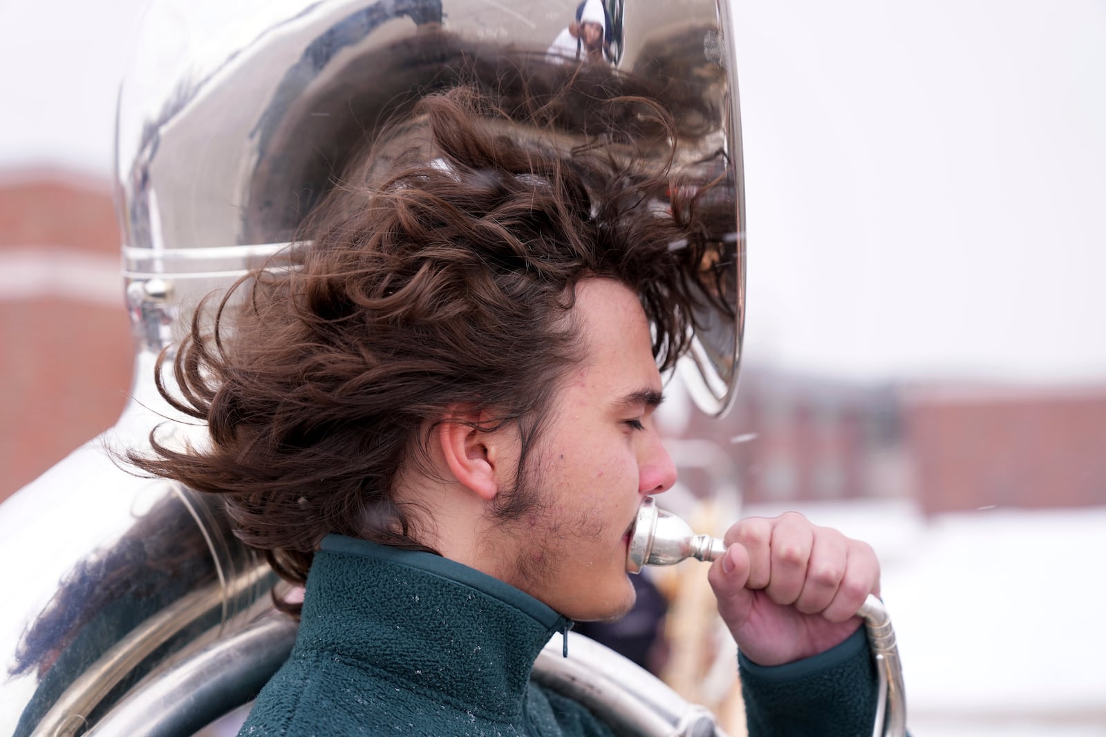 A student of the Middletown High School band practices outside, Tuesday, Jan. 14, 2025, in Middletown, Ohio. The band is set to participate in the inauguration of President-elect Donald Trump on Jan. 20. Middletown is the hometown of Vice President-elect JD Vance.(AP Photo/Kareem Elgazzar)