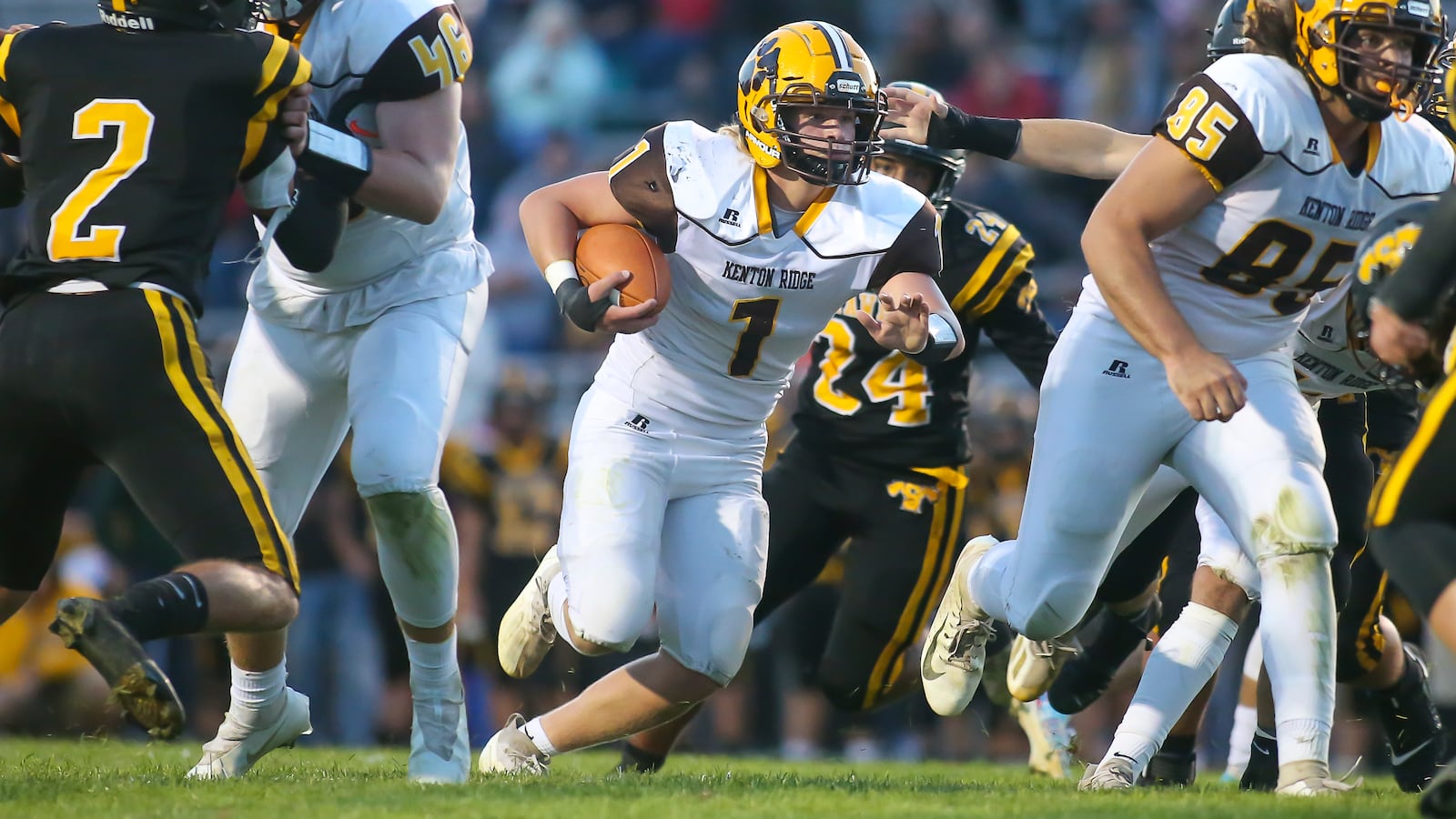 Kenton Ridge High School sophomore Caleb Obee runs the ball during their game against Shawnee on Friday night in Springfield. The Braves won 34-7. Photo by Michael Cooper