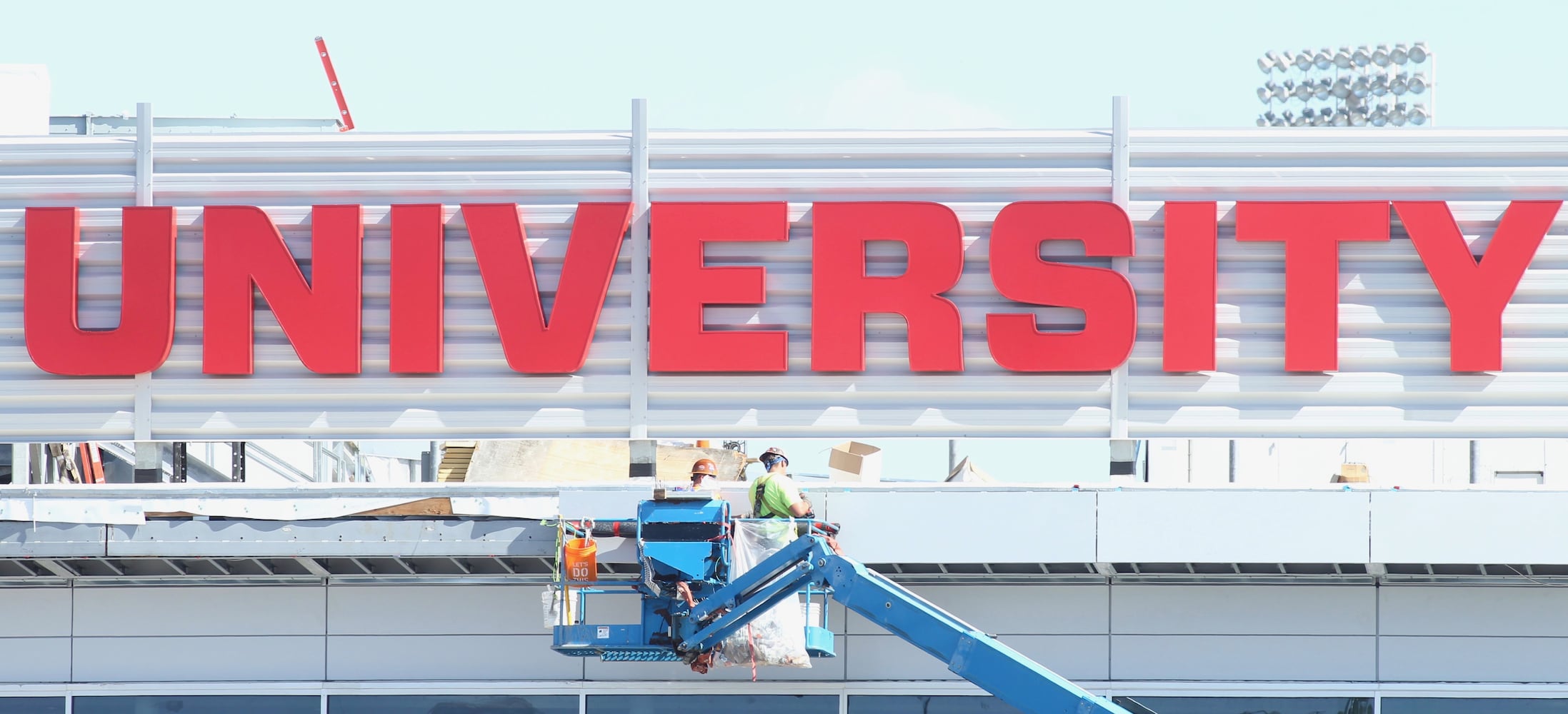 Photos: New sign on top of UD Arena