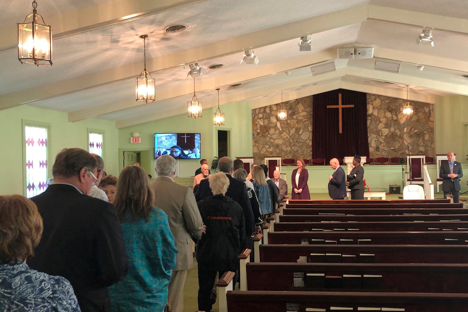 People line up to take a picture with Jimmy Carter after his final Sunday school class on Nov. 3, 2019, at the Maranatha Baptist Church in Plains, Ga. (AP Photo/Paul Newberry)