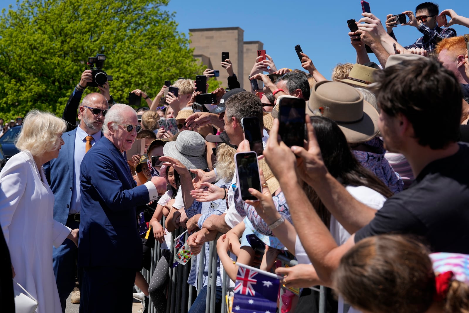 Britain's King Charles III, and Queen Camilla greets by public at the Australian War Memorial in Canberra, Monday, Oct. 21, 2024. (AP Photo/Mark Baker, Pool)