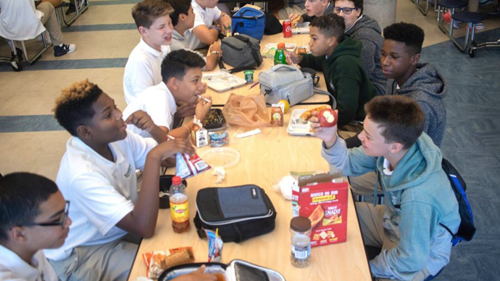 Students at Drew Charter School eat lunch Friday, Aug. 9, 2019.