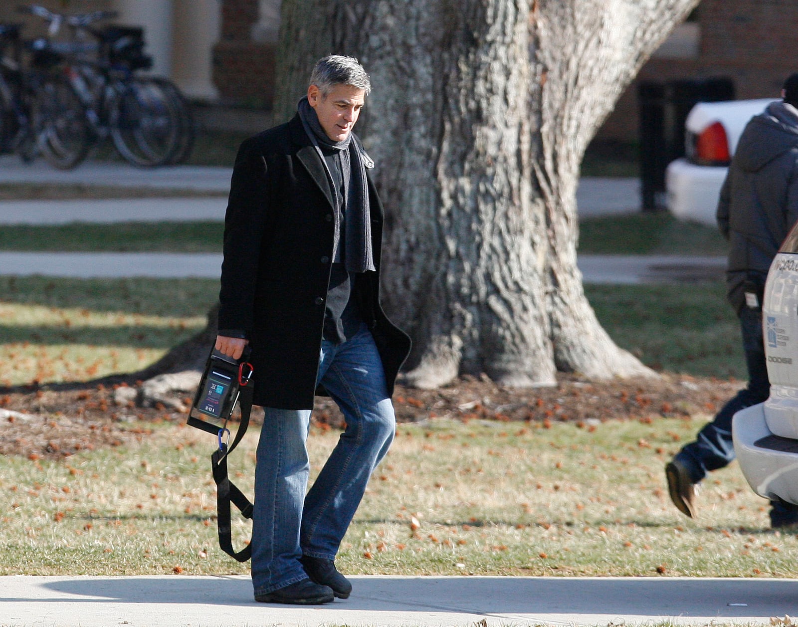 Director George Clooney stands outside The Farmer School of Business during filming of "Ides of March" Tuesday, March 1, 2011 on the Miami University campus in Oxford, Ohio.    Staff photo by Nick Graham