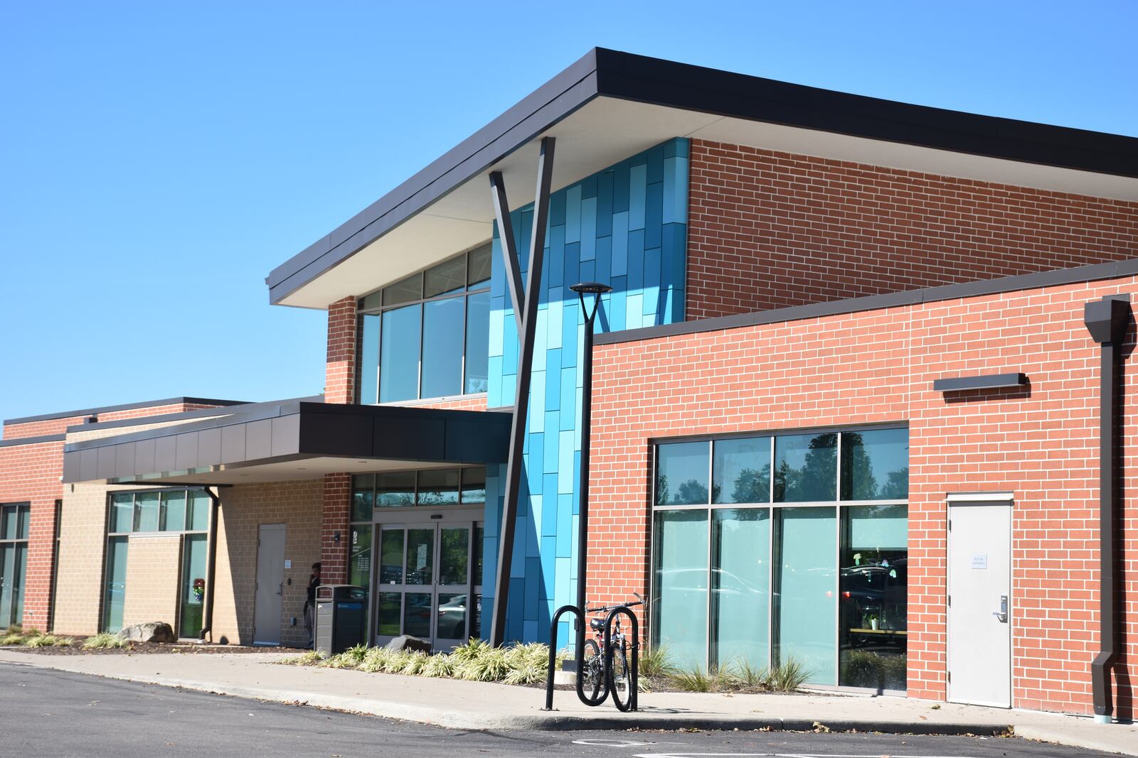 The Dayton Metro Library Southeast Branch at 21 Watervliet Ave. The library has reduced hours after a large fight broke out involving Belmont High School students. The school is next door to the library. CORNELIUS FROLIK / STAFF