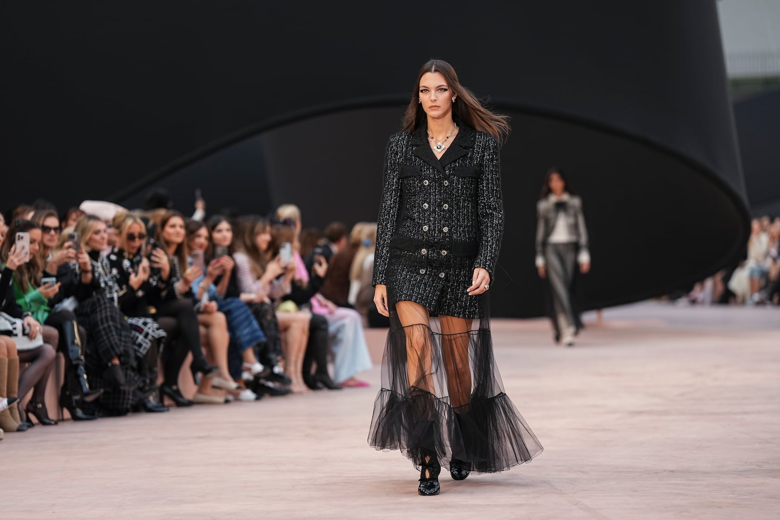 Vittoria Ceretti wears a creation as part of the Chanel Fall/Winter 2025-2026 Womenswear collection presented Tuesday, March 11, 2025. in Paris. (Photo by Scott A Garfitt/Invision/AP)