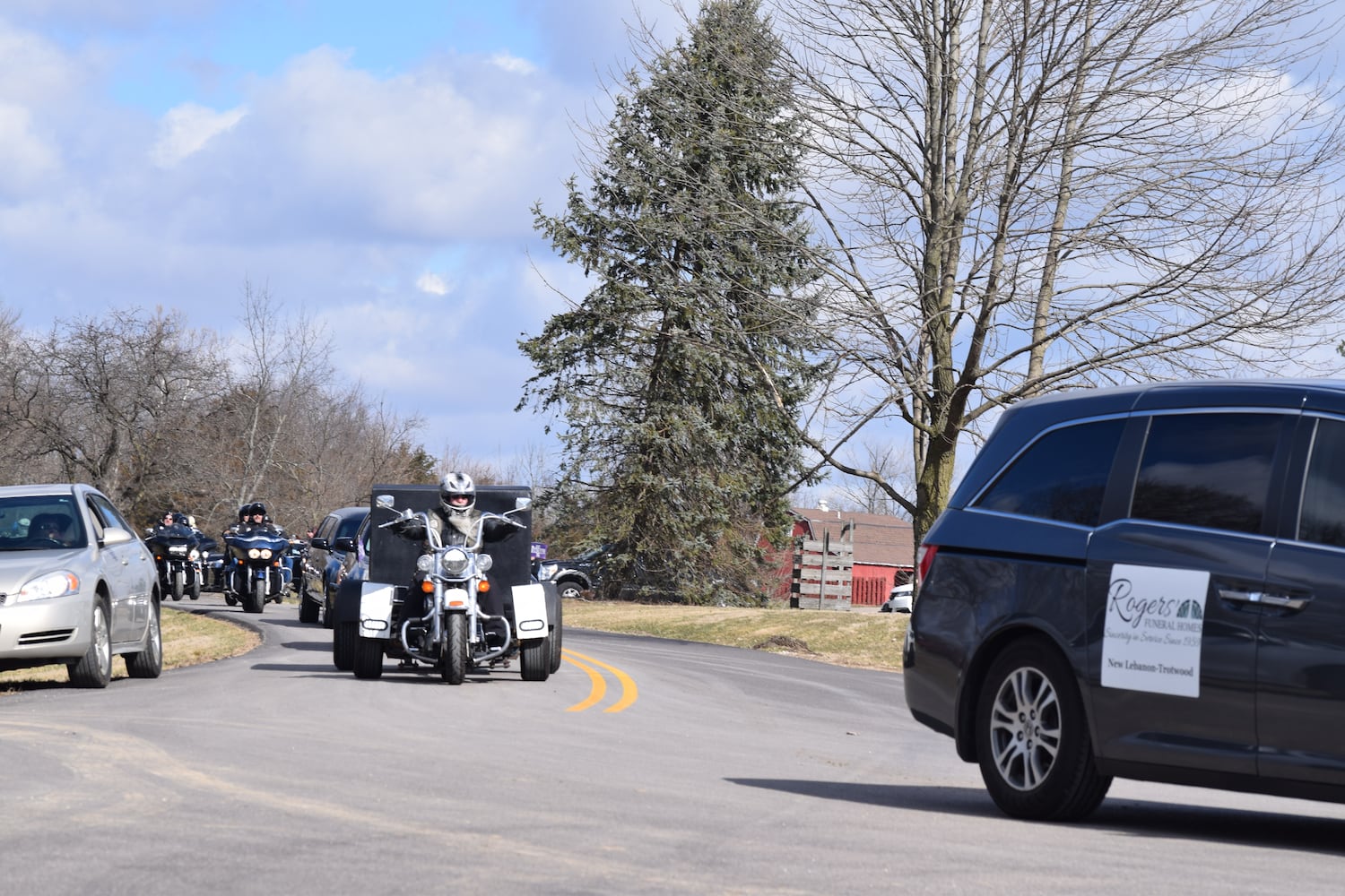 PHOTOS: Thousands of Outlaws attend motorcycle gang leaders funeral at Montgomery County Fairgrounds.