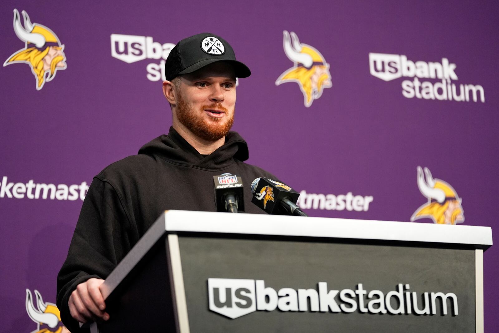 Minnesota Vikings' Sam Darnold talks after an NFL football game against the Green Bay Packers Sunday, Dec. 29, 2024, in Minneapolis. (AP Photo/Abbie Parr)