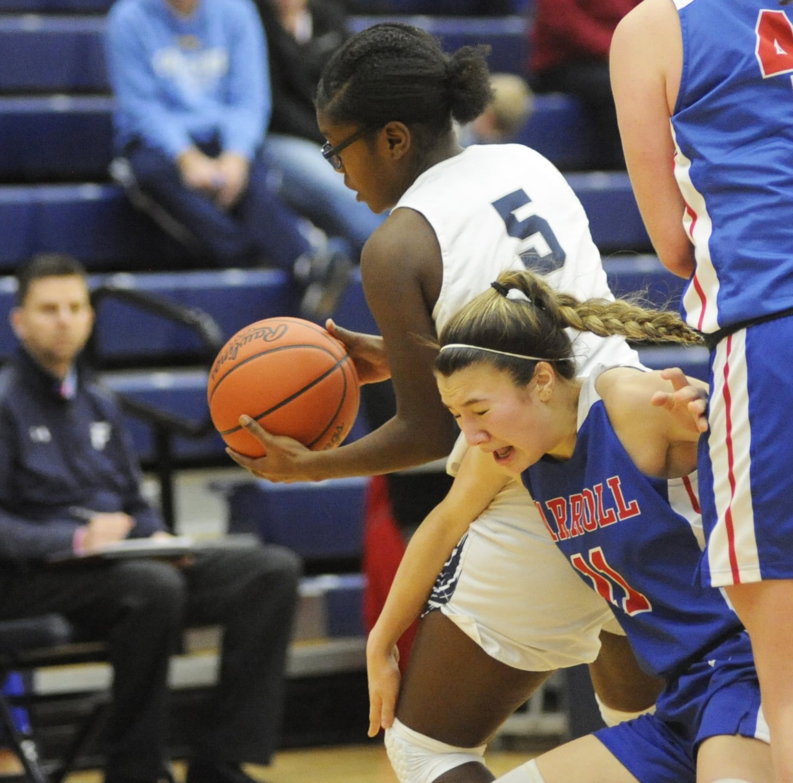 Kierra Thornton of Fairmont (with ball) avoids Ava Lickliter of Carroll. Carroll defeated host Fairmont 64-60 in double-OT in a girls high school basketball game at Trent Arena on Monday, Jan. 28, 2019. MARC PENDLETON / STAFF