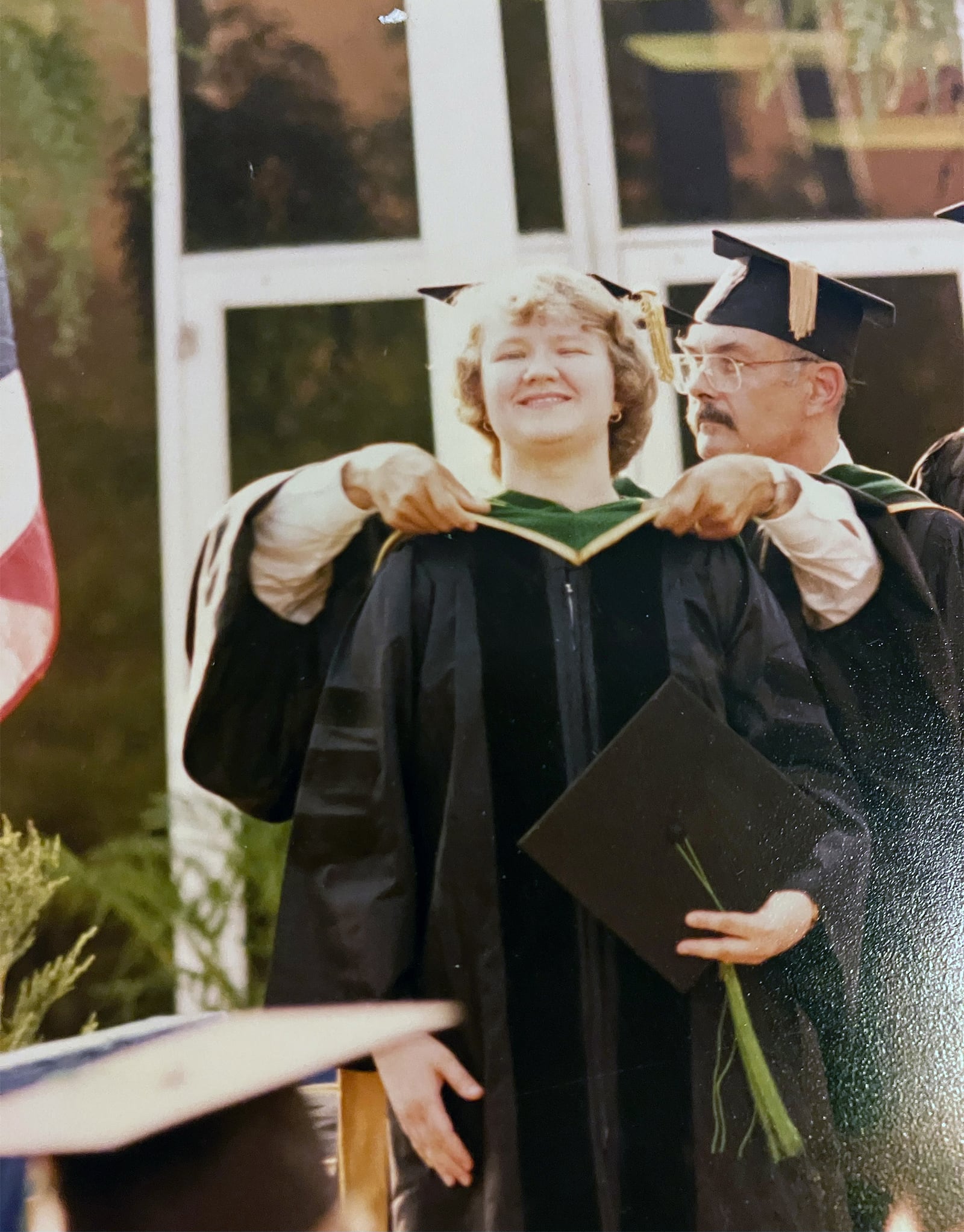 Kaine (L) at her graduation from medical school at Wright State University in 1982 with Robert J. Kegerreis (R)