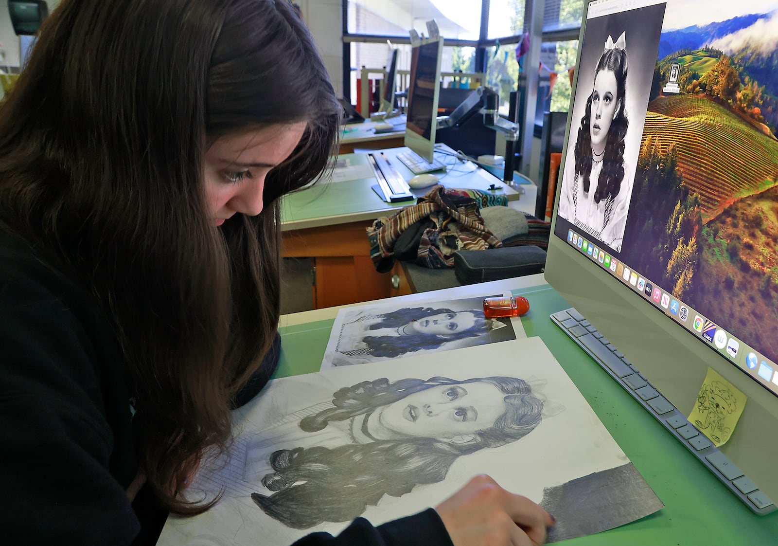 Chelsea Armes, junior, Northeastern High School, works on a project in the Computer Graphic Arts program. BILL LACKEY/STAFF