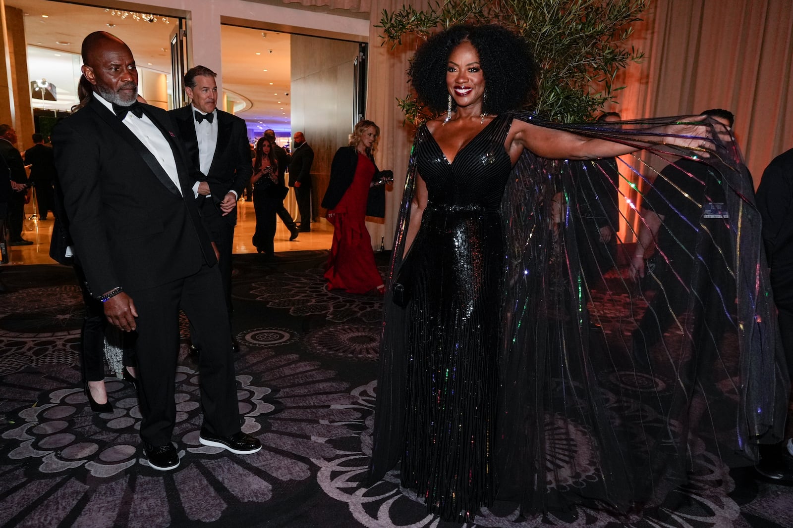 Julius Tennon, left, and Viola Davis arrive at the 82nd Golden Globes on Sunday, Jan. 5, 2025, at the Beverly Hilton in Beverly Hills, Calif. (AP Photo/Chris Pizzello)