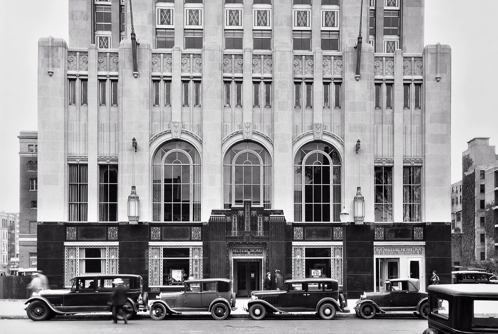 The Liberty Tower, originally named the Mutual Home Building, is adorned at the street level base with 16-foot-high black marble and floral deco engravings.  Limestone keystones top the arched windows and decorative stone spandrel panels are placed at each of the three setbacks on the tower. LIBERTY TOWER ARCHIVES