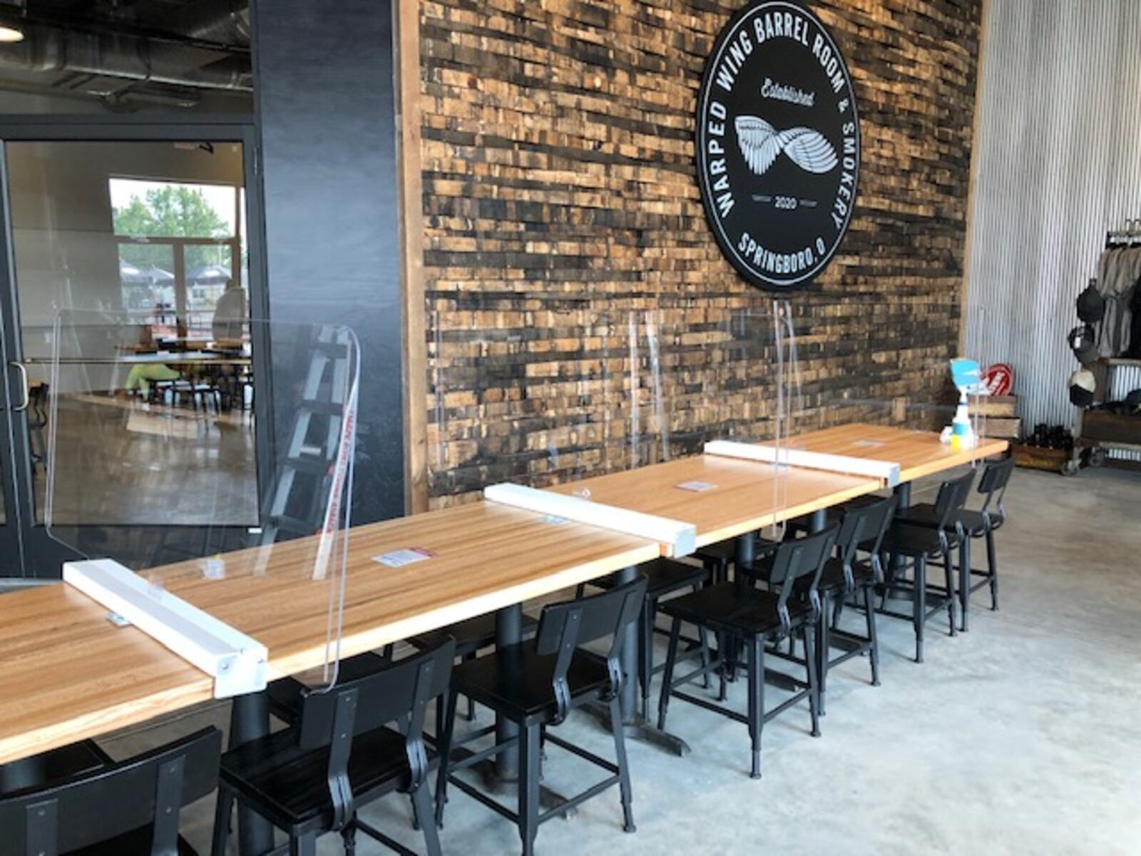 Dayton-based Warped Wing Brewing Co. will open its ambitious new second location, The Warped Wing Barrel Room & Smokery, to the public on Saturday, Aug. 29, in Springboro. MARK FISHER/STAFF


The 20,000-square-foot facility at the crossroads of Springboro at State Routes 73 and 741 will house a tap room, a restaurant, an outdoor biergarten-style patio, a large space for barrel-aging beers, a test-pilot brewery, a distribution hub and event space