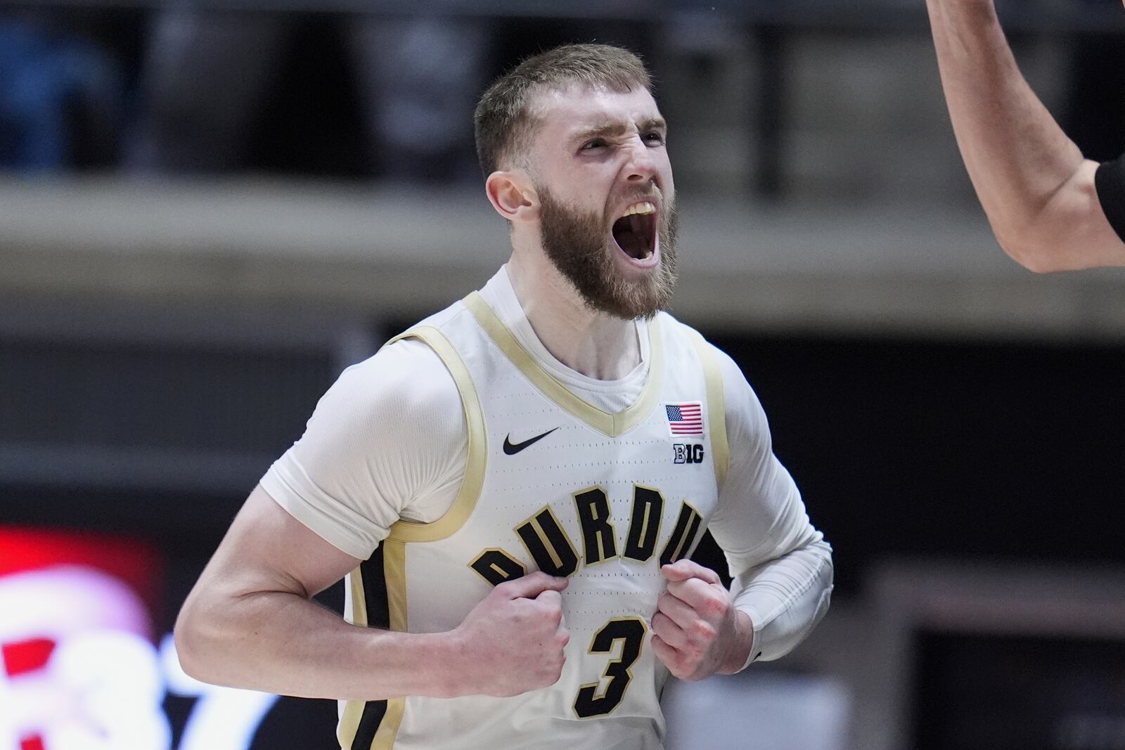 Purdue guard Braden Smith (3) celebrates after a basket against Rutgers during the second half of an NCAA college basketball game in West Lafayette, Ind., Tuesday, March 4, 2025. (AP Photo/Michael Conroy)