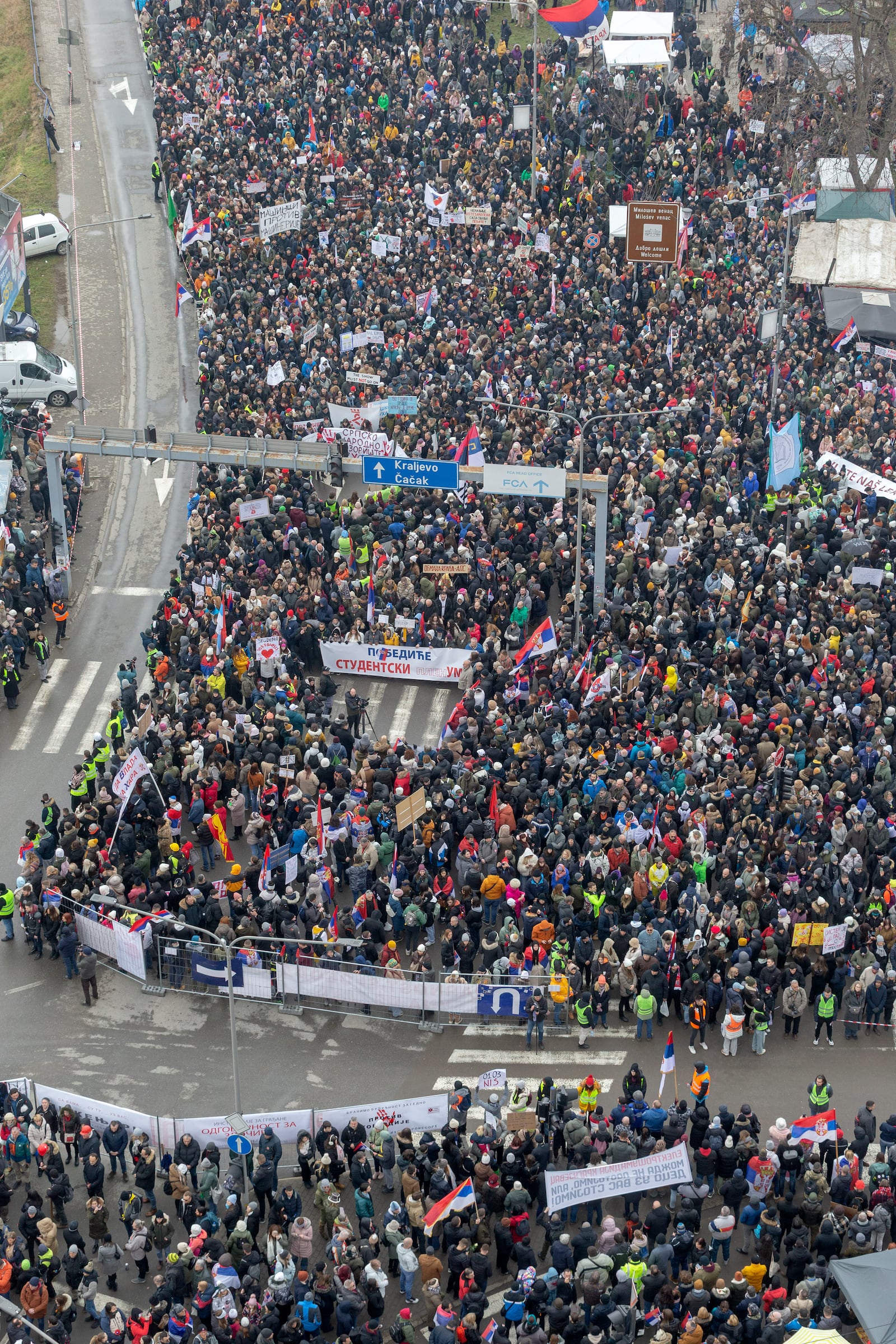 People attend a protest triggered after a concrete canopy on a railway station in the northern city of Novi Sad collapsed on Nov. 1, 2024 killed 15 people, in Kragujevac, Serbia, Saturday, Feb. 15, 2025. (AP Photo/Marko Drobnjakovic)