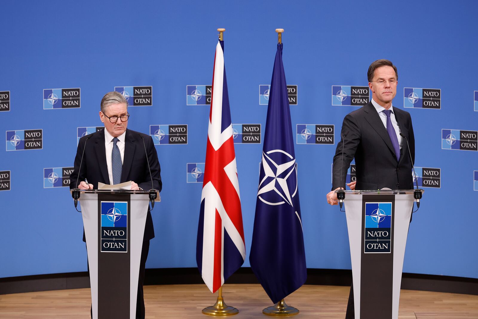 Britain's Prime Minister Keir Starmer, left, and NATO Secretary General Mark Rutte speak during a press conference at NATO headquarters in Brussels, Monday, Feb. 3, 2025. (AP Photo/Omar Havana, Pool)