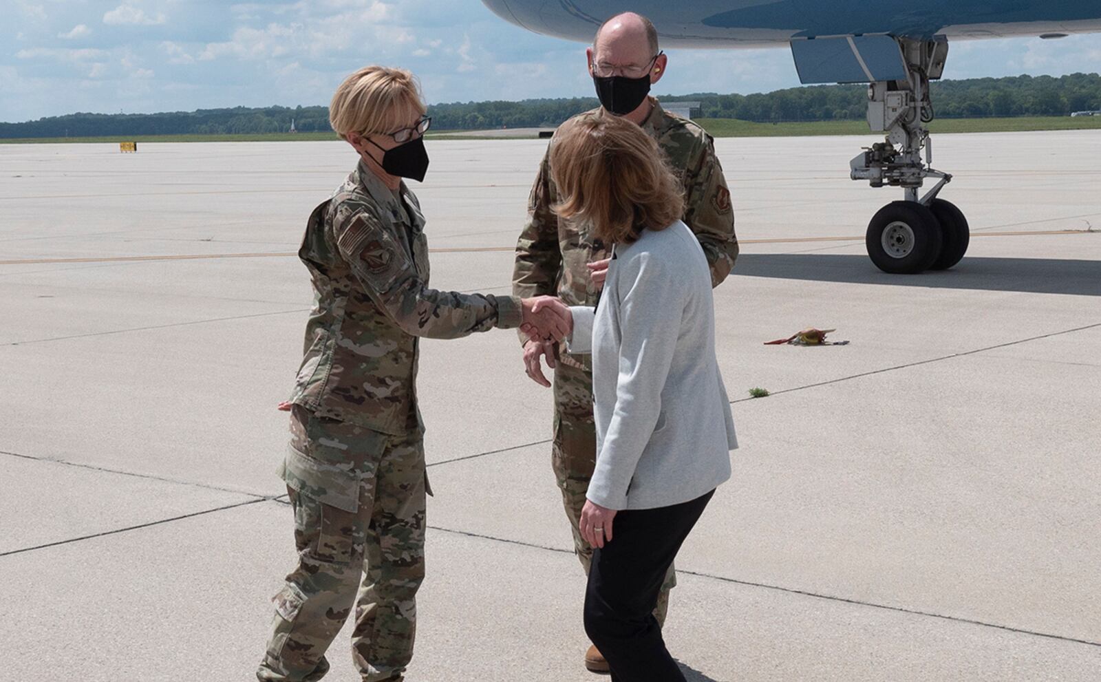 Maj. Gen. Heather Pringle, Air Force Research Laboratory commander, and Gen. Duke Richardson, commander of Air Force Materiel Command, greet Deputy Secretary of Defense Kathleen Hicks, who visited Wright-Patterson Air Force Base on Aug. 17.  U.S. AIR FORCE PHOTO/KEITH LEWIS