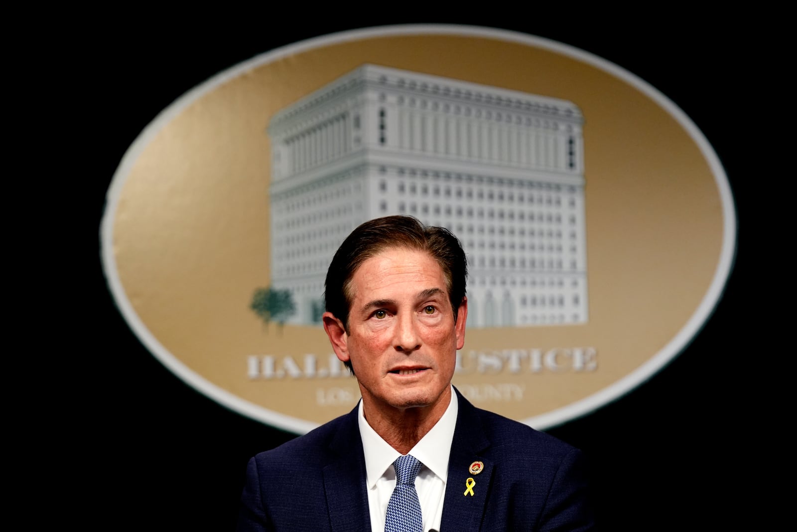 FILE - Los Angeles County District Attorney Nathan Hochman talks about the resentencing of Erik and Lyle Menendez for the murders of their parents decades ago during a news conference in downtown Los Angeles, Friday, Jan. 3, 2025. (AP Photo/Damian Dovarganes, File)