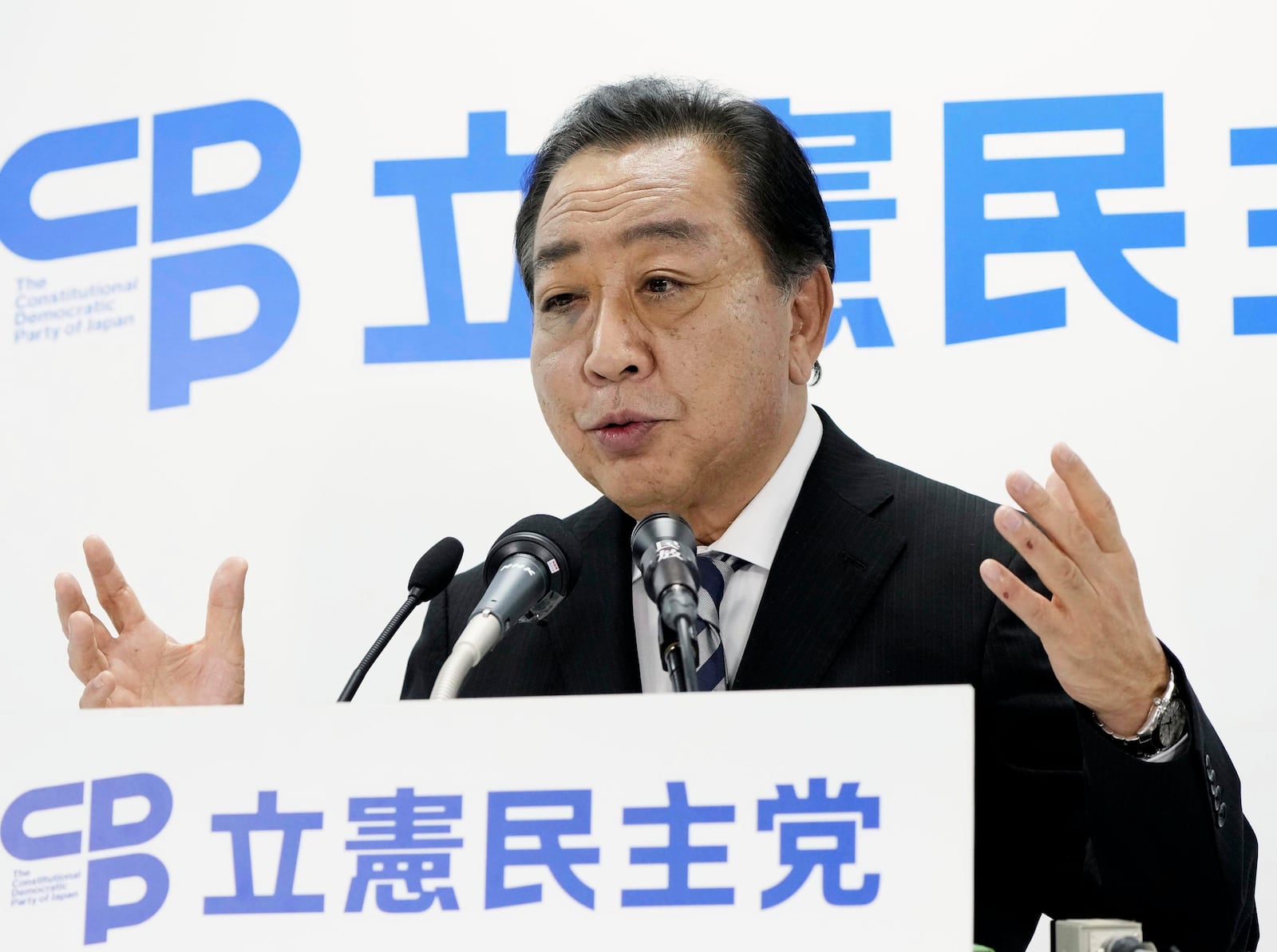 Yoshihiko Noda, leader of Japan's opposition Constitutional Democratic Party, speaks to the media regarding the lower house election at the party's headquarters Sunday, Oct. 27, 2024 in Tokyo, (Kyodo News via AP)