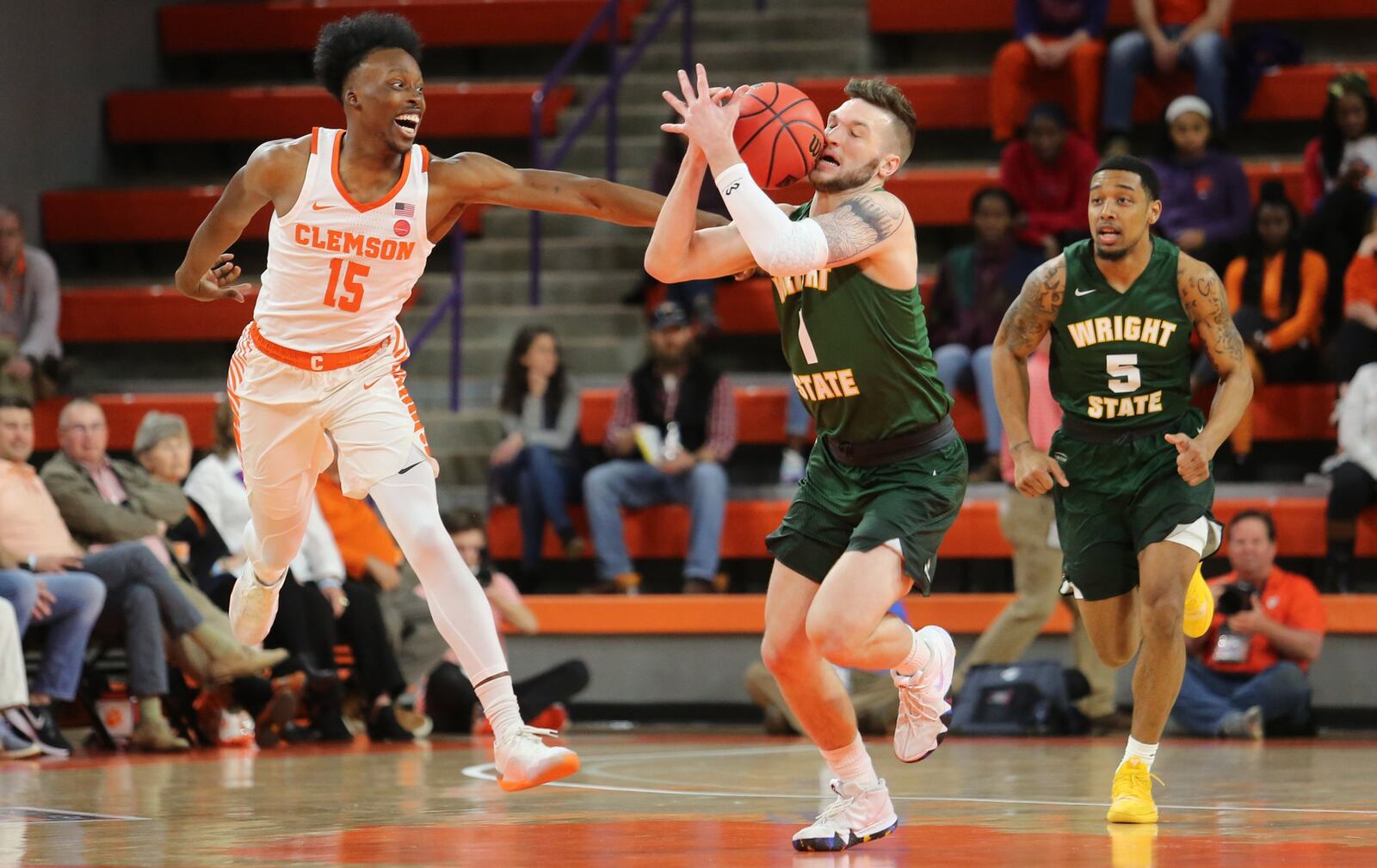 Clemson’s John Newman (15) defends Wright State’s Bill Wampler (1) as Skyelar Potter (5) trails the play during Tuesday night’s NIT game at Littlejohn Coliseum in Clemson, S.C. Clemson won 75-69. PHOTO COURTESY OF CLEMSON ATHLETICS