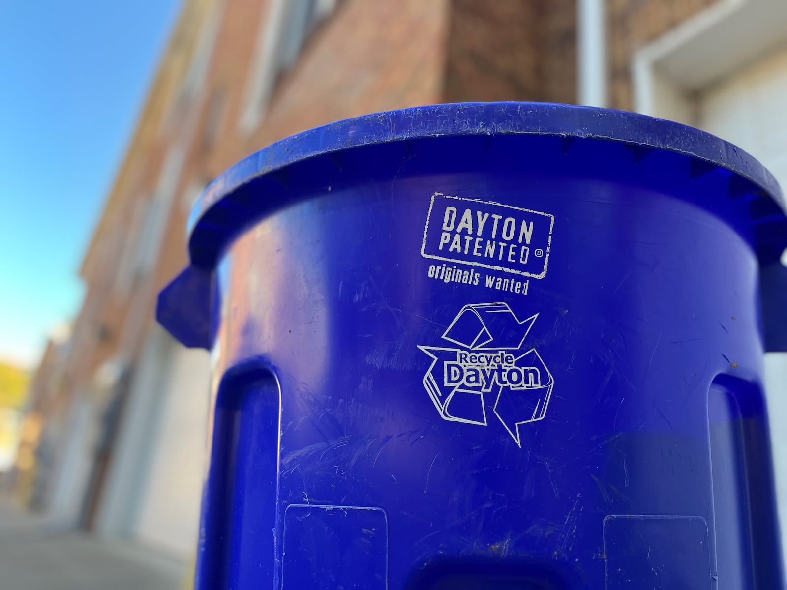 A recycling bin in a residential area in downtown Dayton. CORNELIUS FROLIK / STAFF