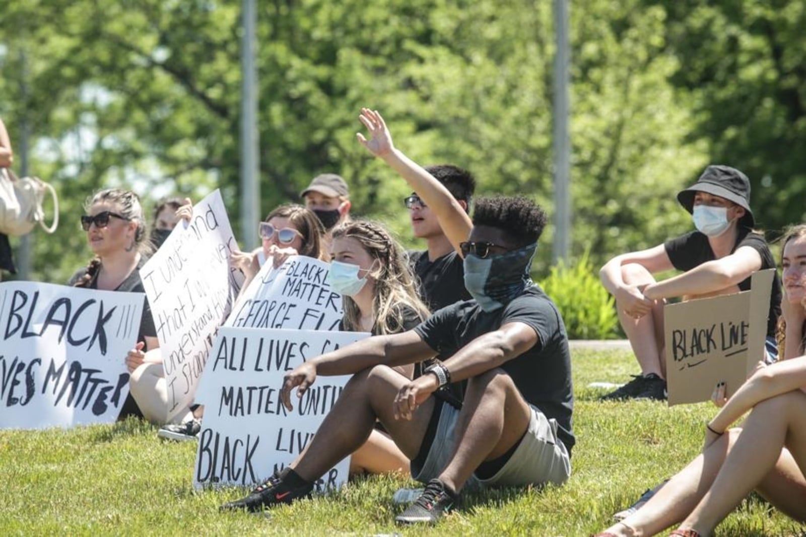 A crowd of mostly young people gathers in Springboro Tuesday afternoon, June 2, 2020, to protest the death of George Floyd in police custody in Minneapolis. JIM NOELKER / STAFF