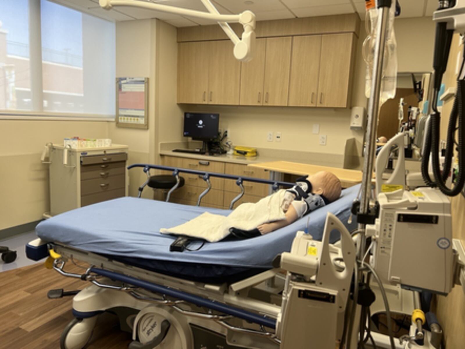 One of the rooms within Dayton Children's new simulation center, which includes a child-sized mannequin and other equipment with which health care workers can practice providing care. CONTRIBUTED