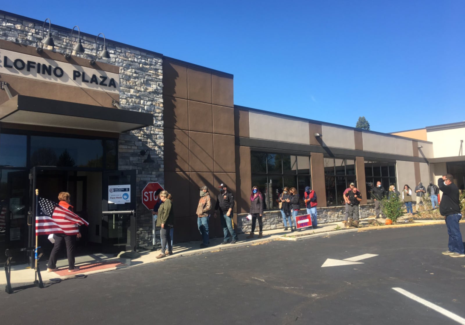 A small line formed outside the polling place at Lofino Plaza in Greene County early Tuesday afternoon. A voter in line said that the line was moving quickly. PARKER PERRY/STAFF